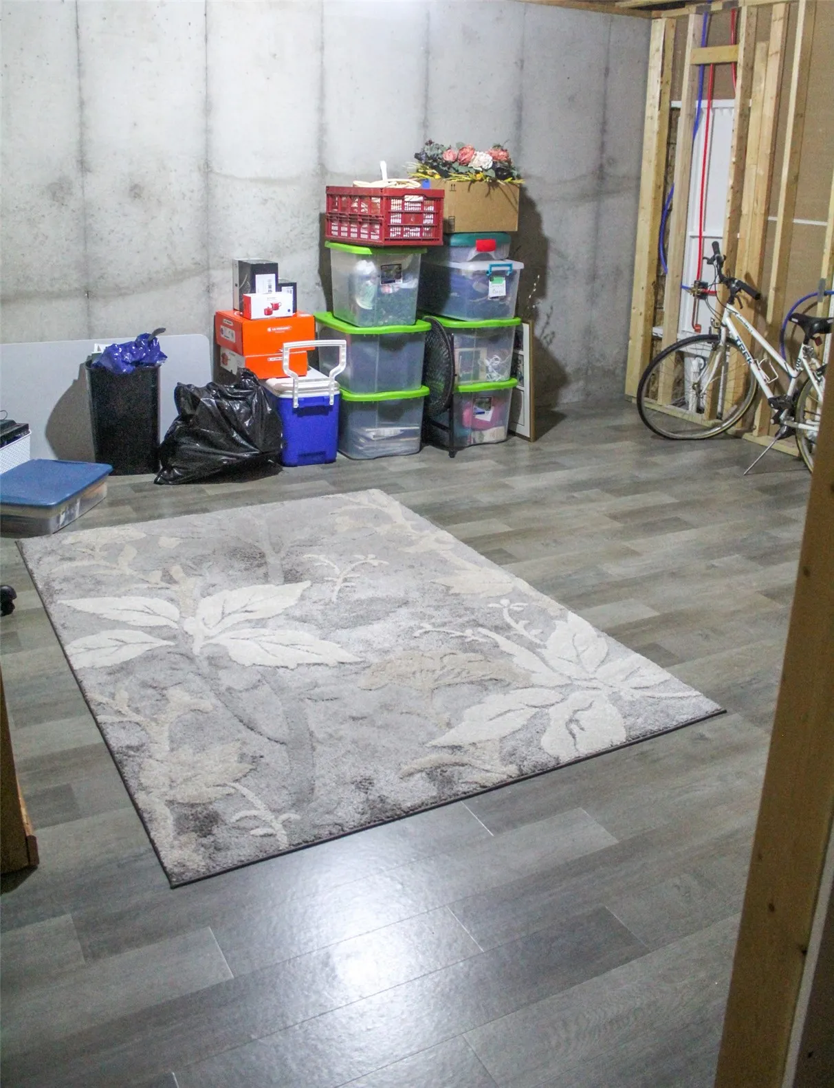 Yes, the storage area has LVT in it!