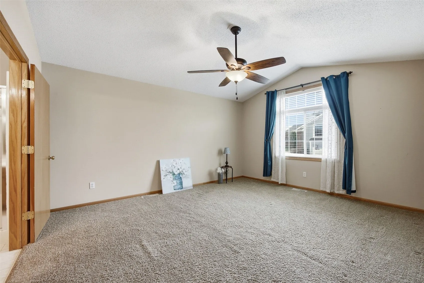 Primary bedroom suite is bright and very large