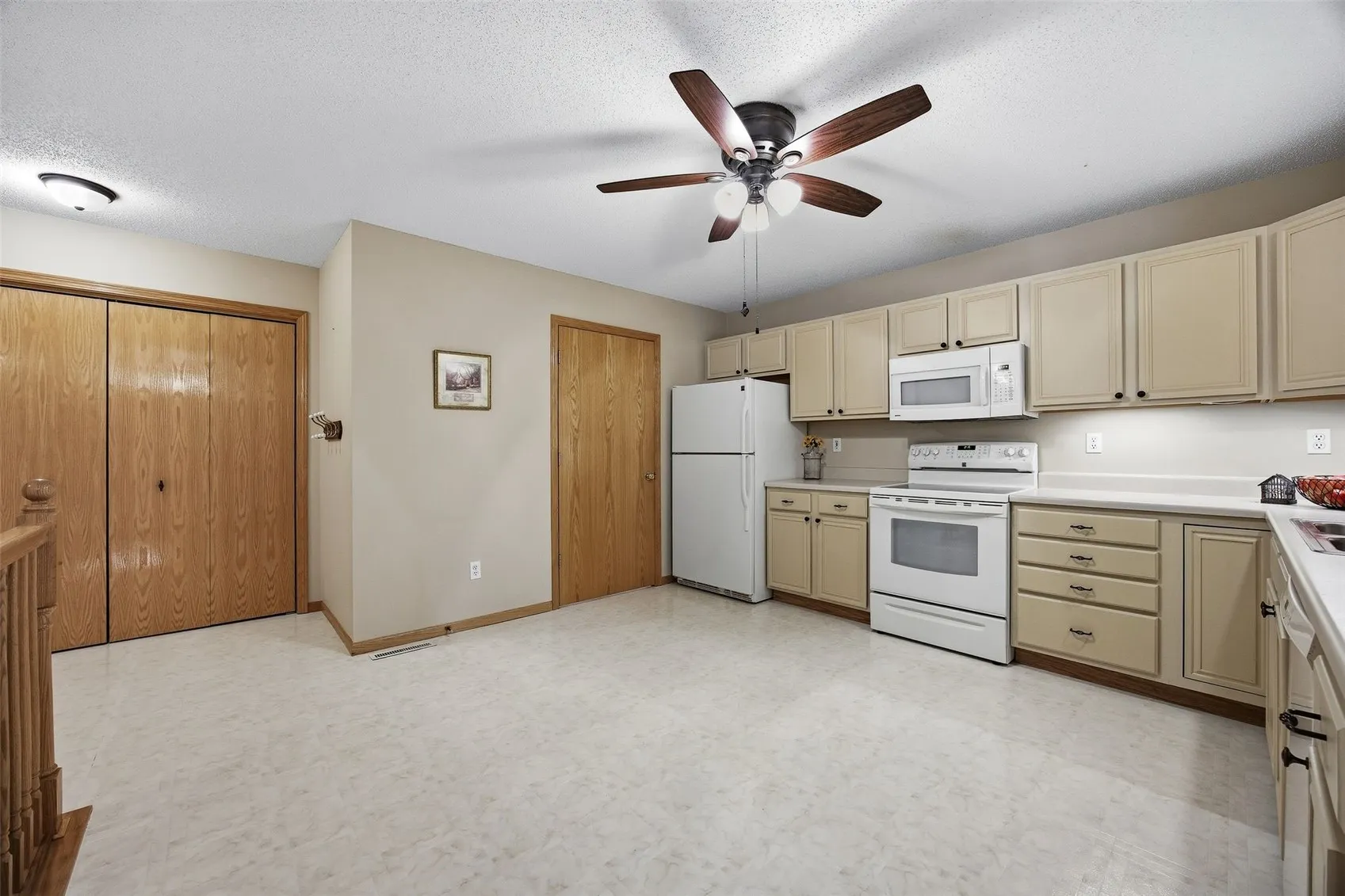 Huge eat in kitchen with large pantry and large first floor laundry room