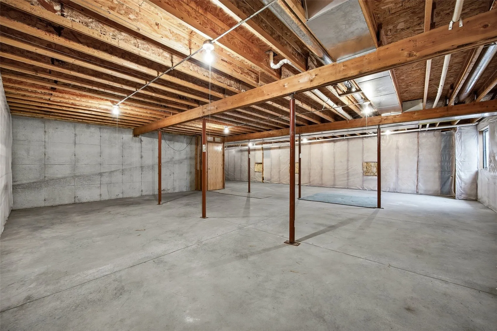 Lower level ready for storage, workshop or crafts or future finish