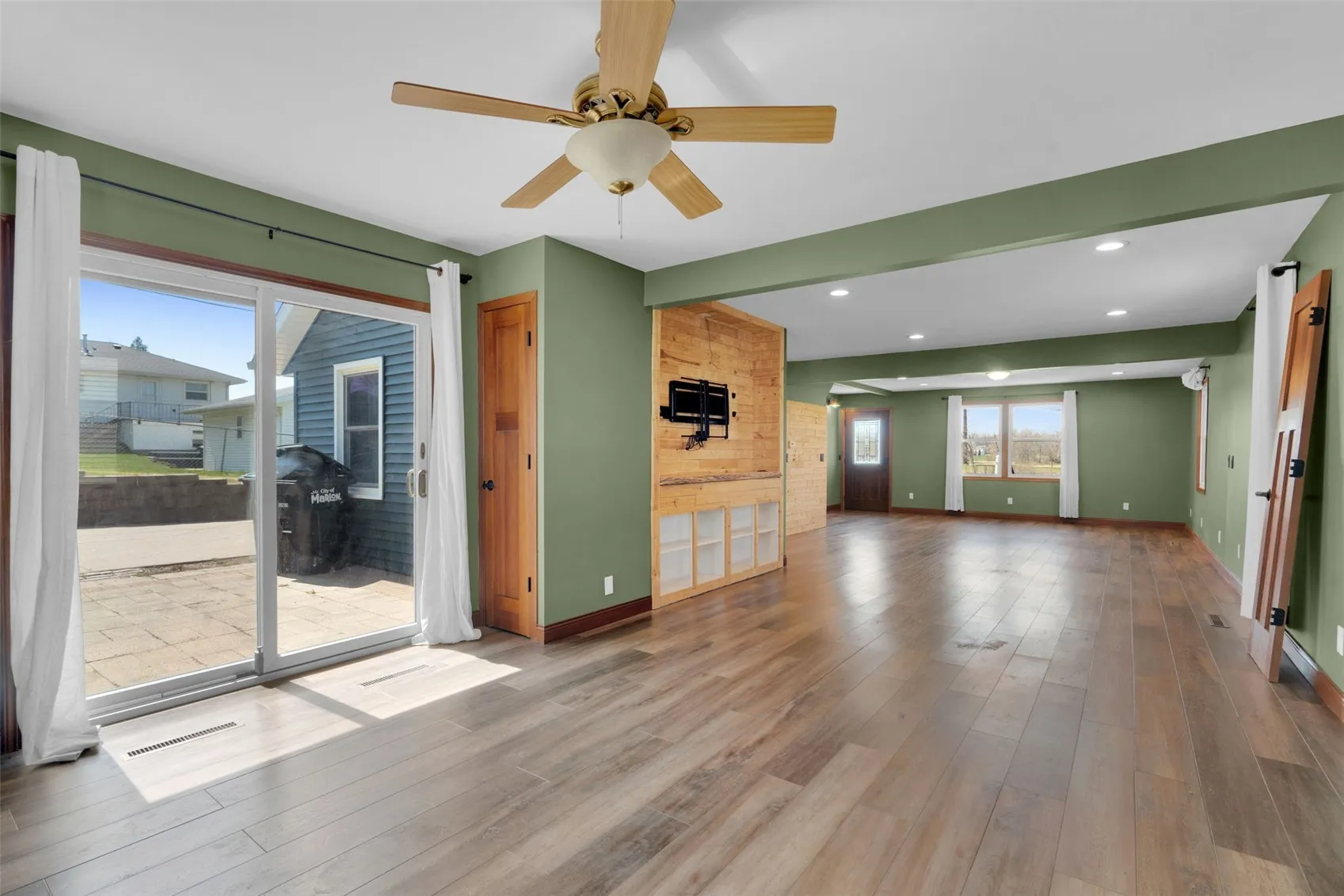 Living room wit sliders to side patio