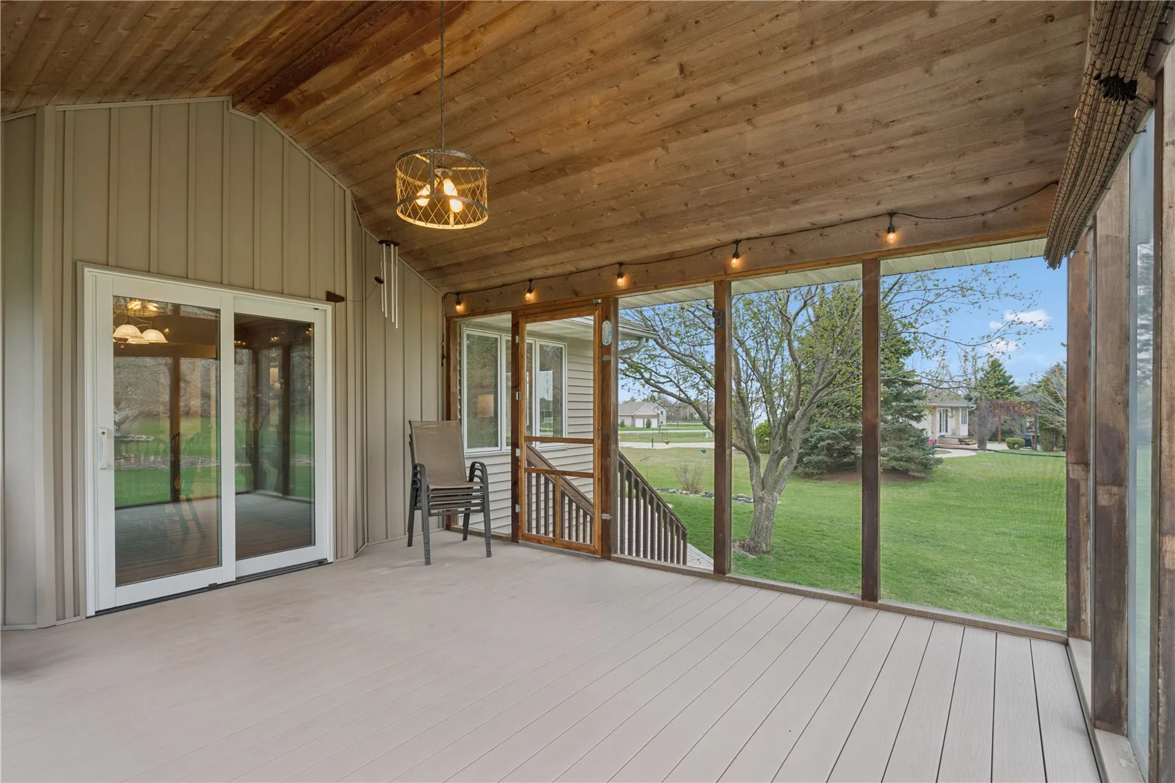 Vaulted screen porch is 14'10