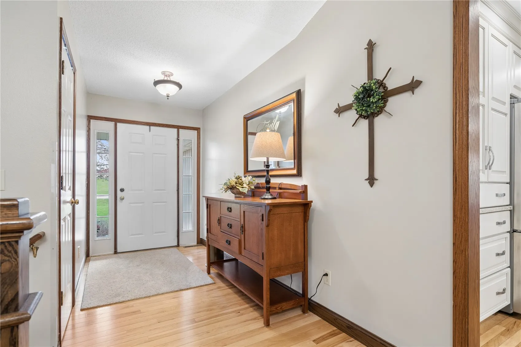 Generous sized entry with coat closet to welcome guests