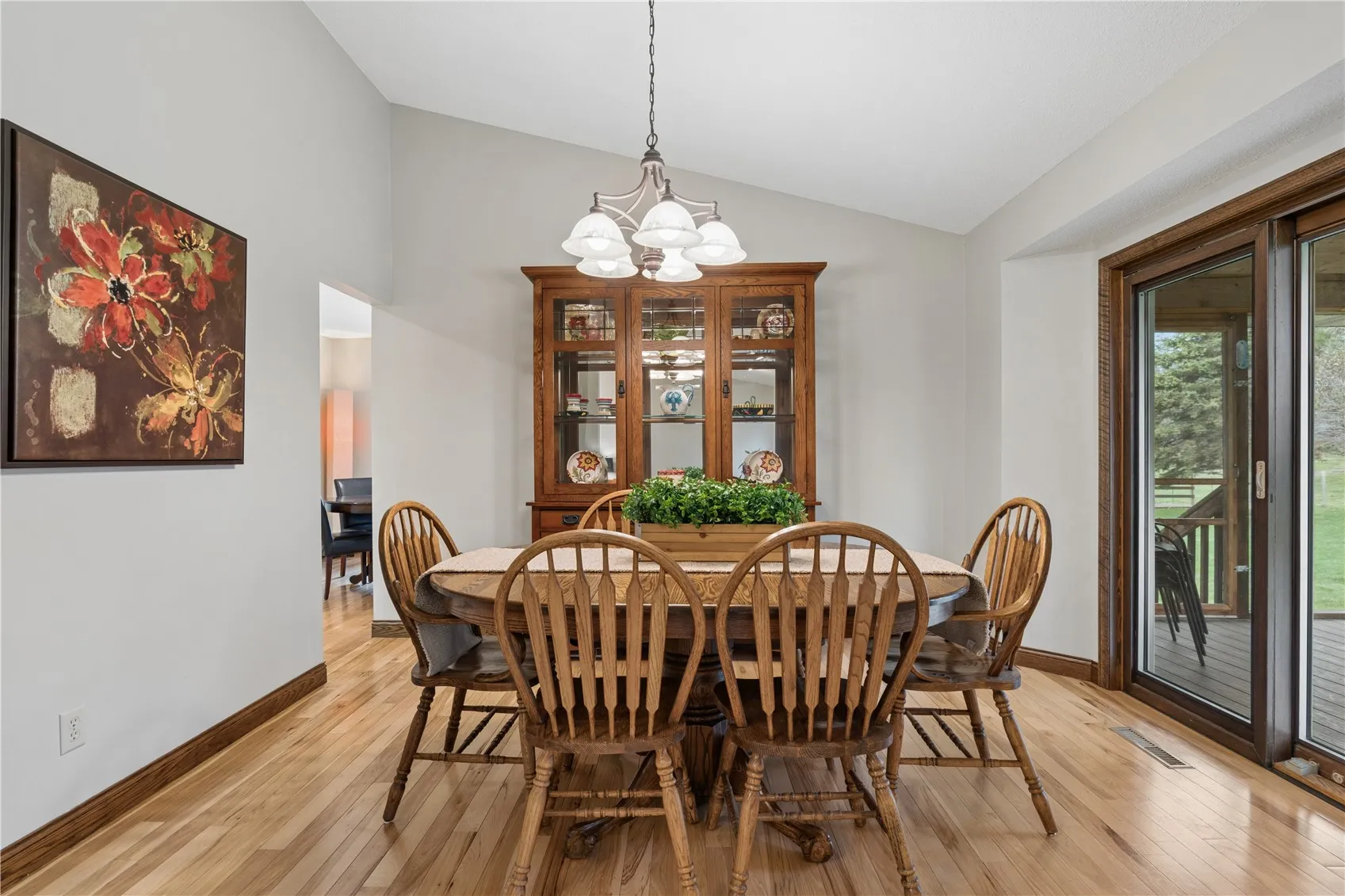 Dining room just off kitchen and living room. Measures 12'8