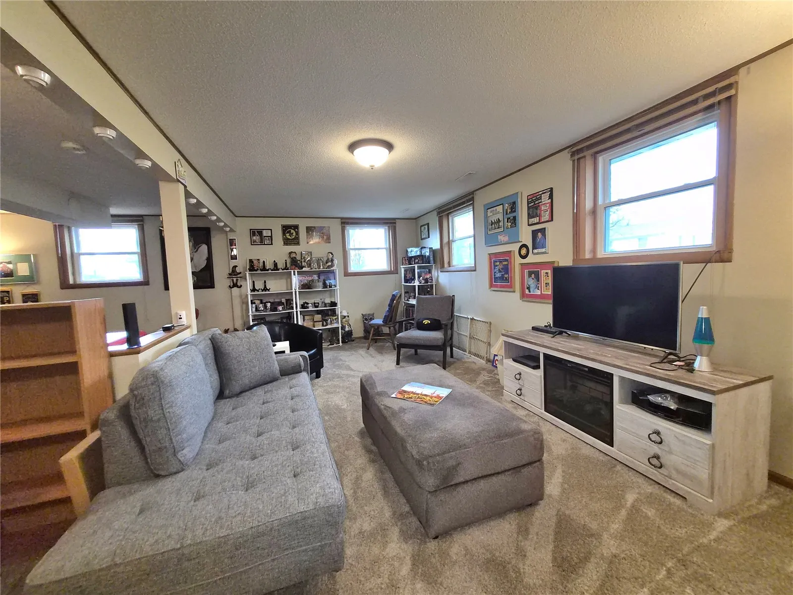 Large bright and sunny family room with room for a wet or dry bar.