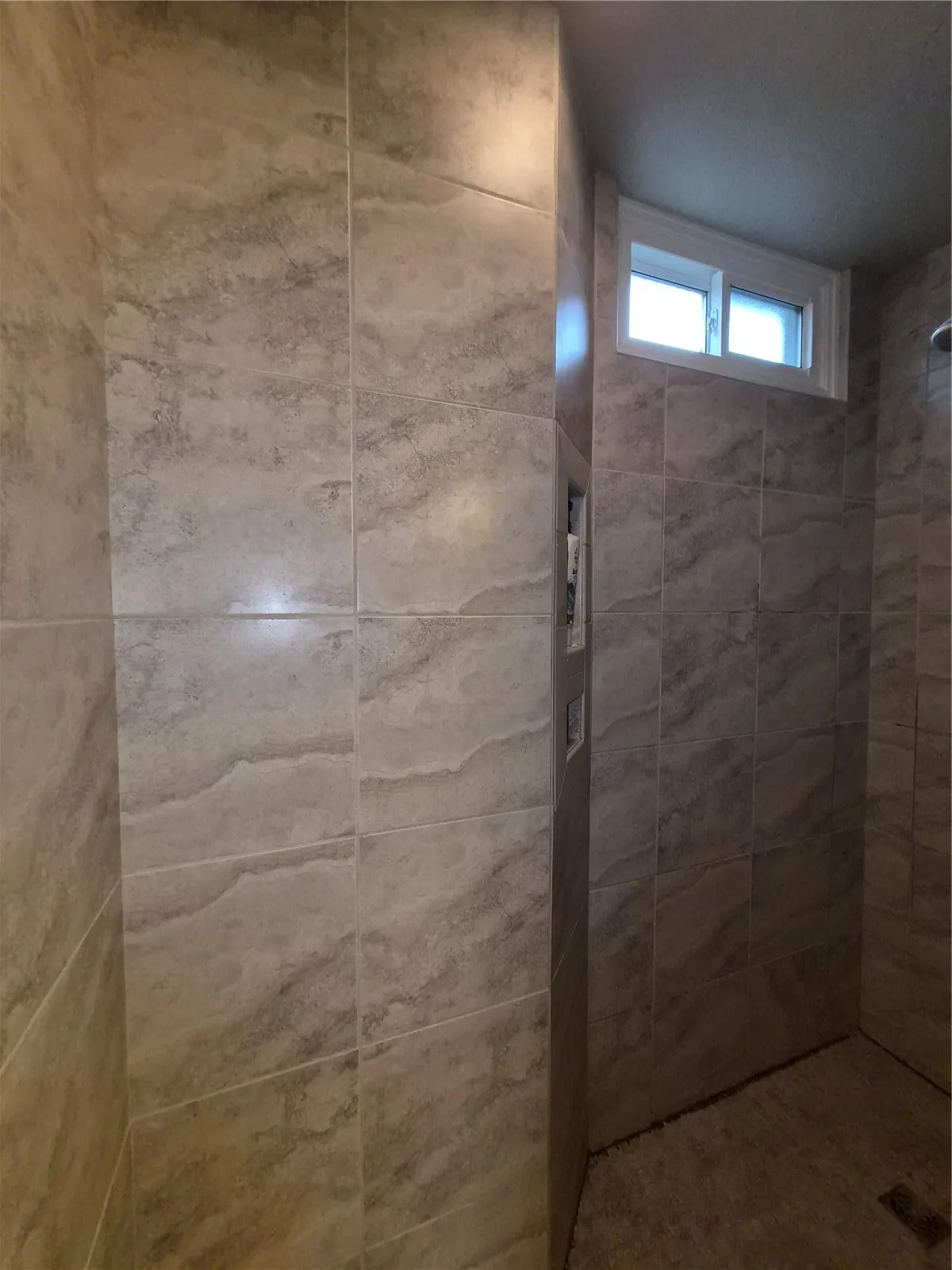 Tile shower in lower level