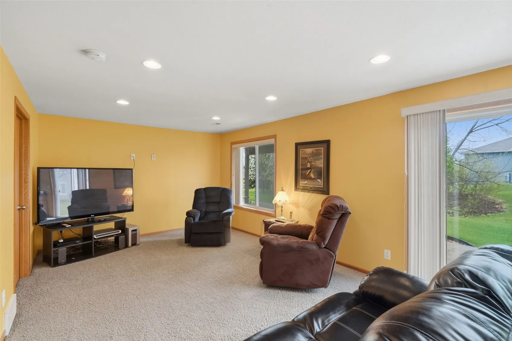 Lower level with great light and a=walkout sliders