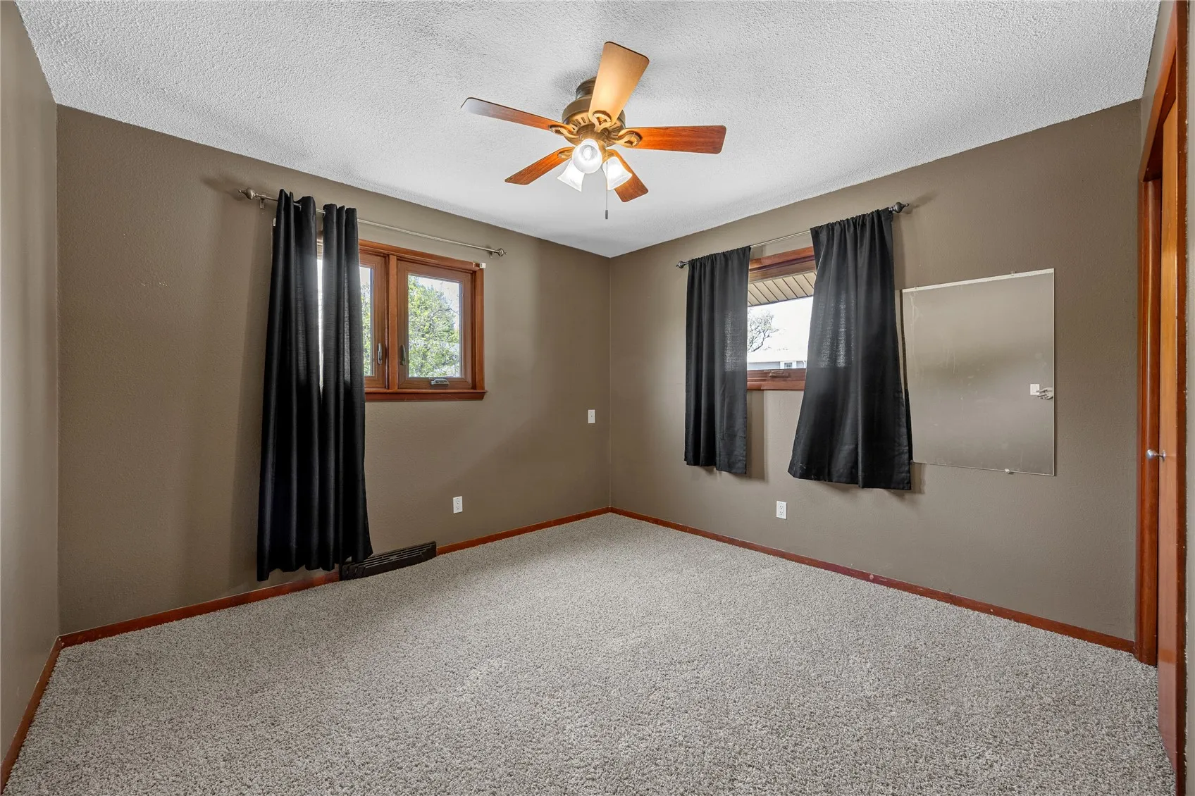 The third bedroom has ample space.