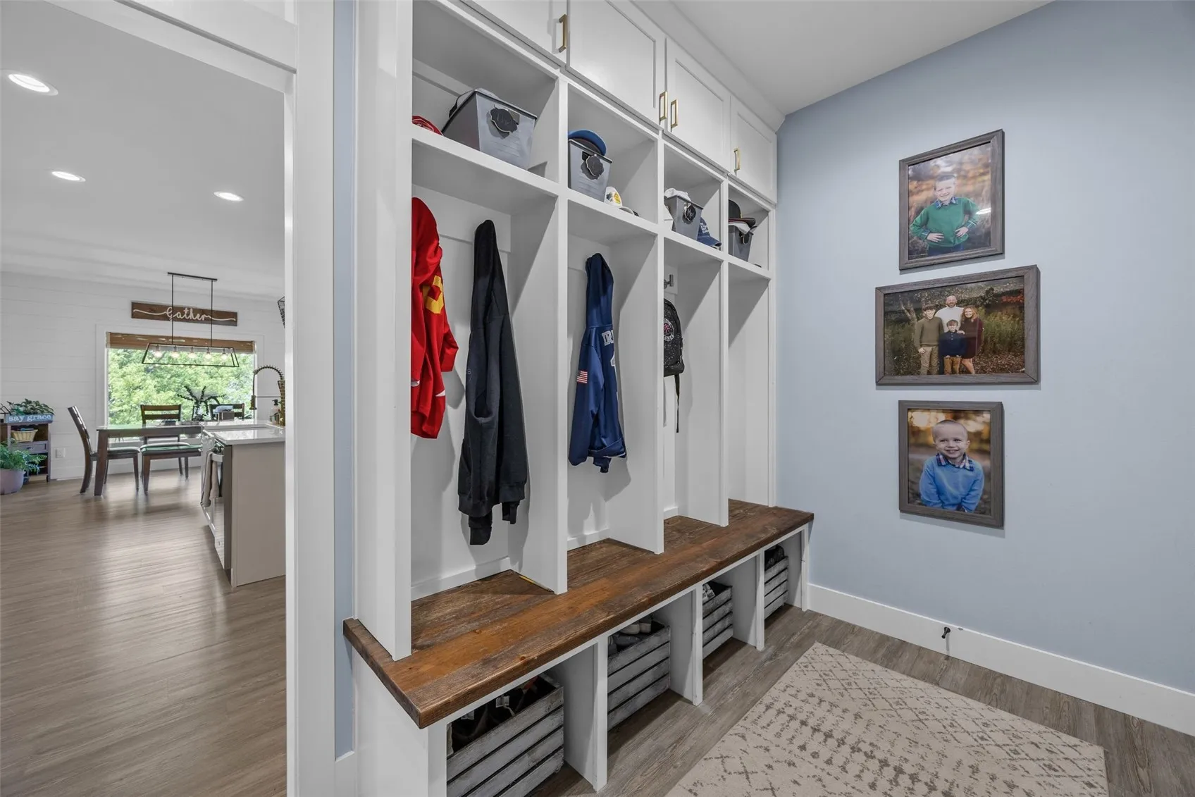 Mudroom with four lockers and area for the shoes.