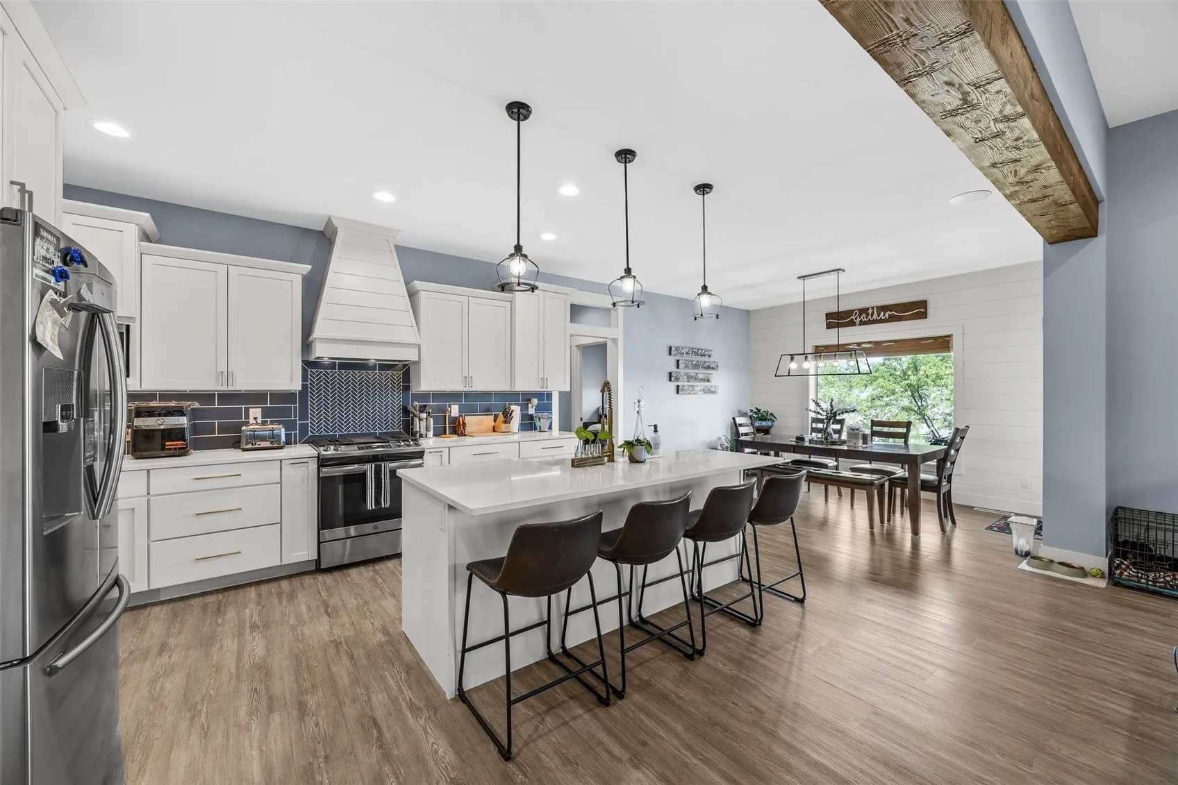 View of the kitchen. Check out the high ceilings.