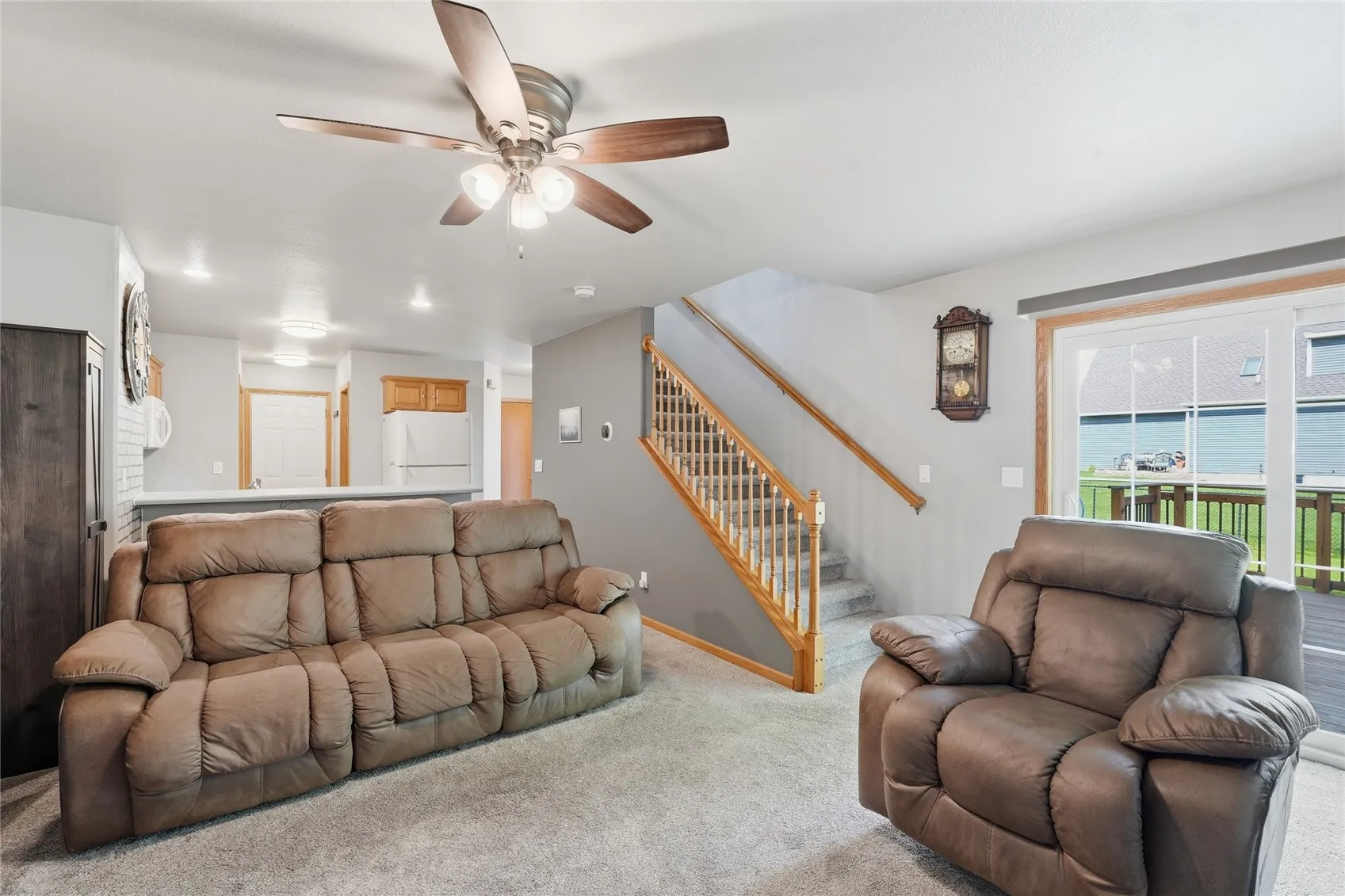 Living room with stairs to 2nd floor