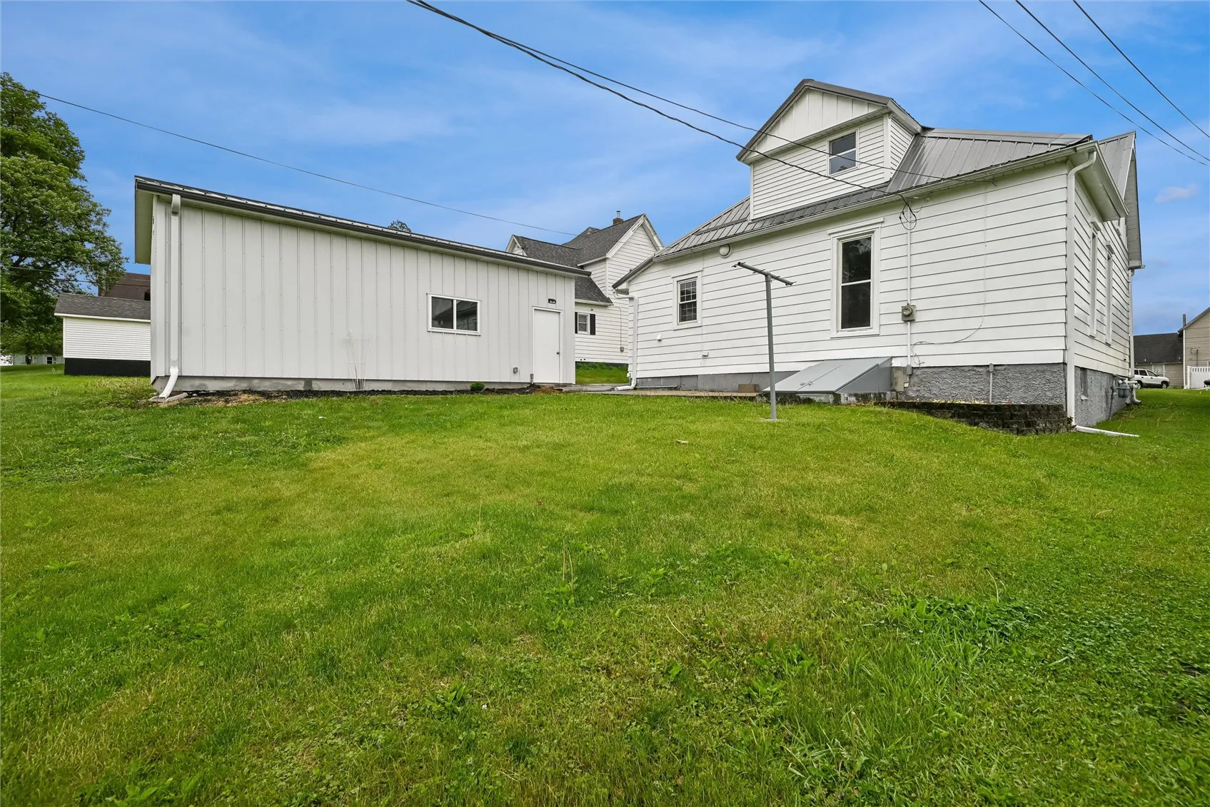 Backside of the home and garage