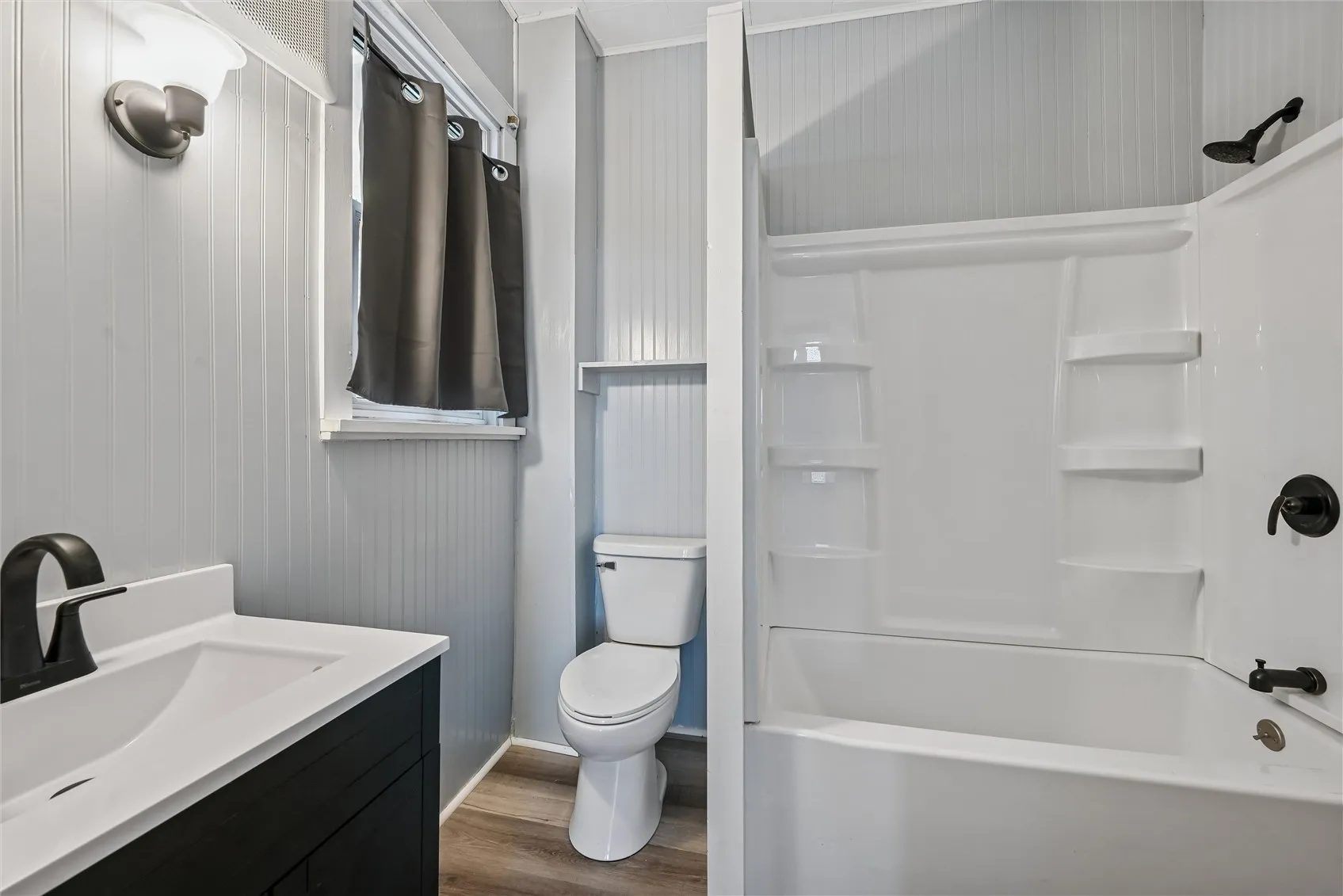 New shower, toilet, sink.lighting