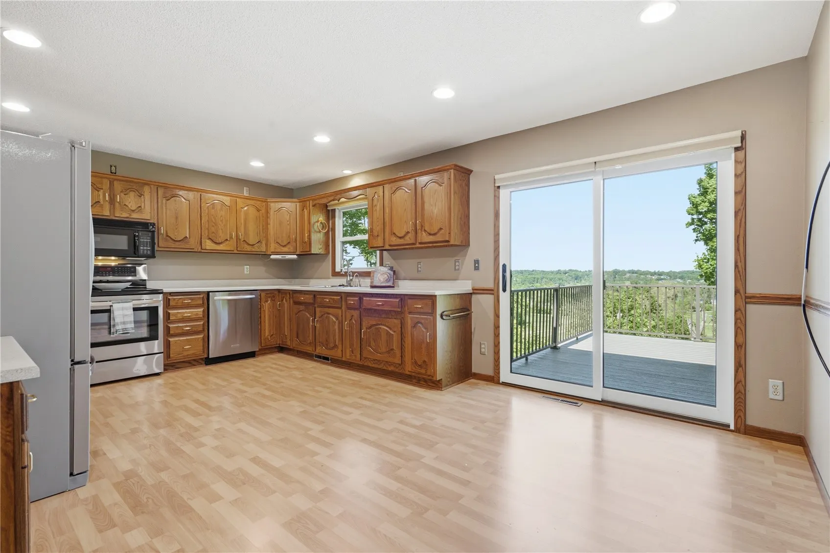 kitchen overlooking deck with expansive views