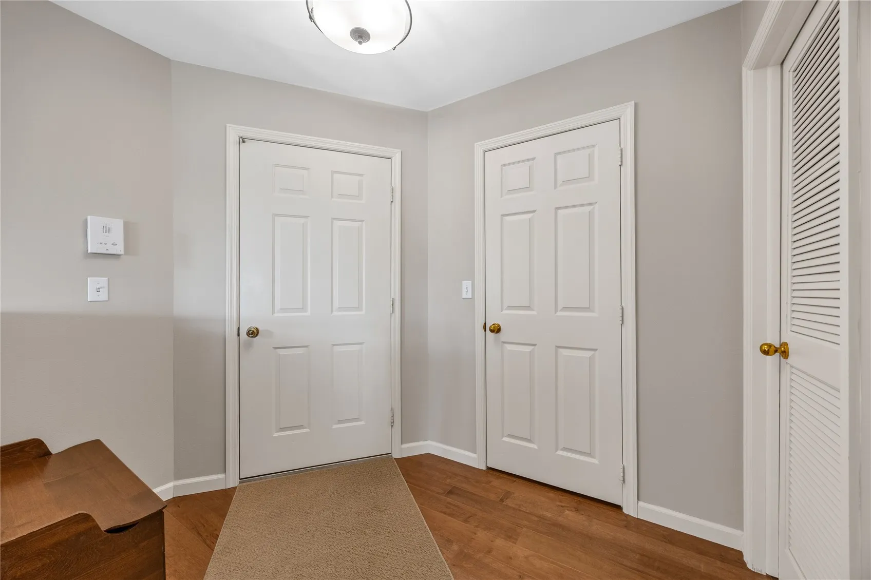 Entry: Doors: L to REntry, Closet, Utility room