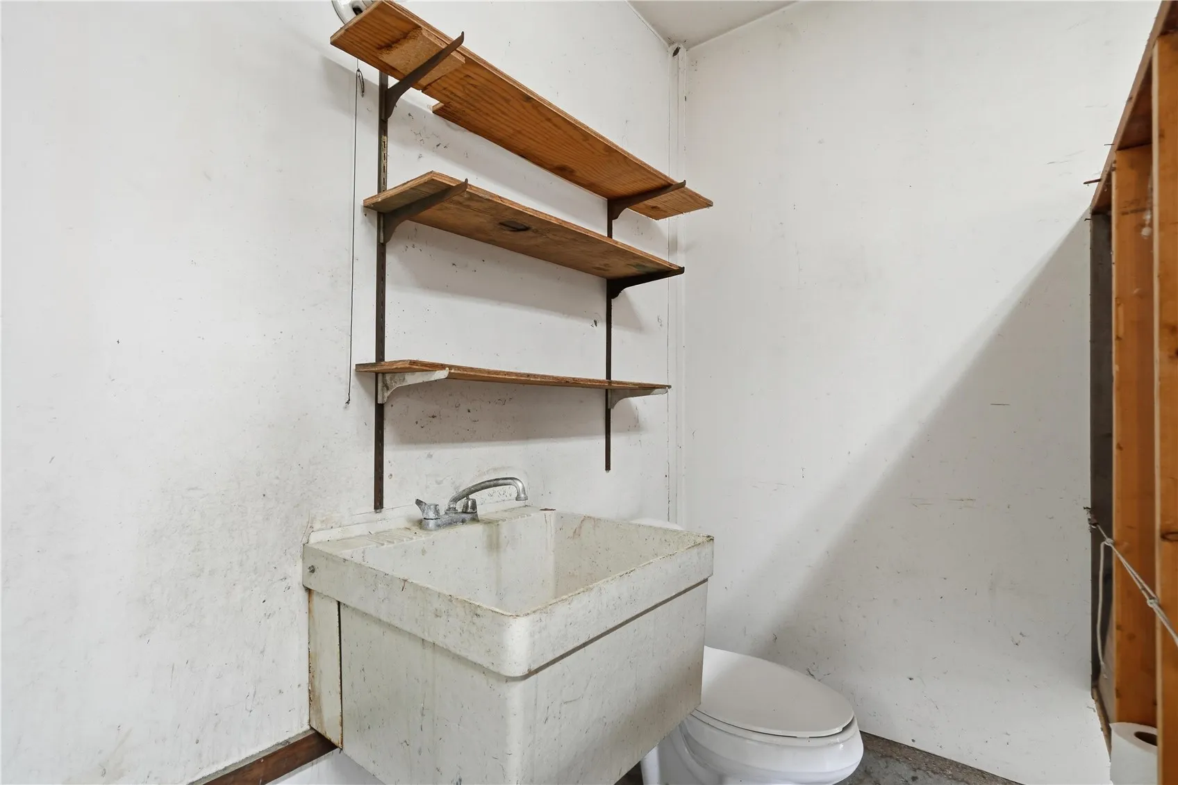 There is a half bath inside the heated garage!