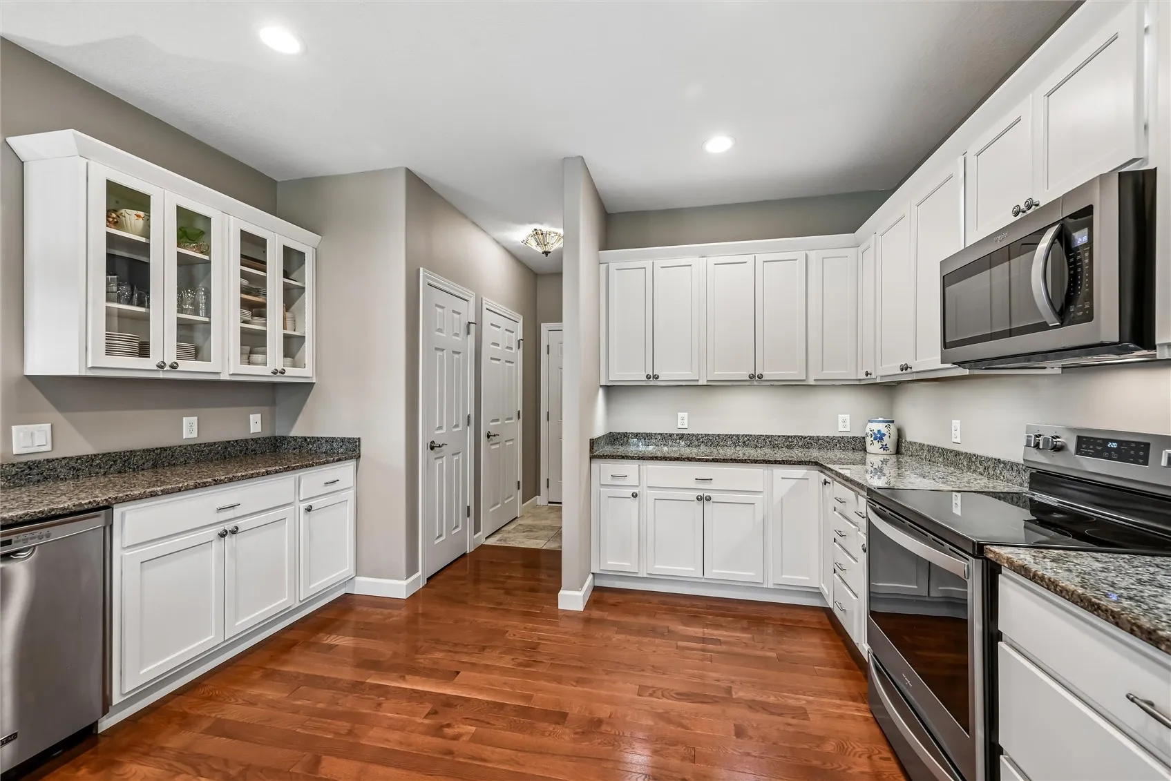 Hallway to garage - Pantry - coat closet - Laundry on right