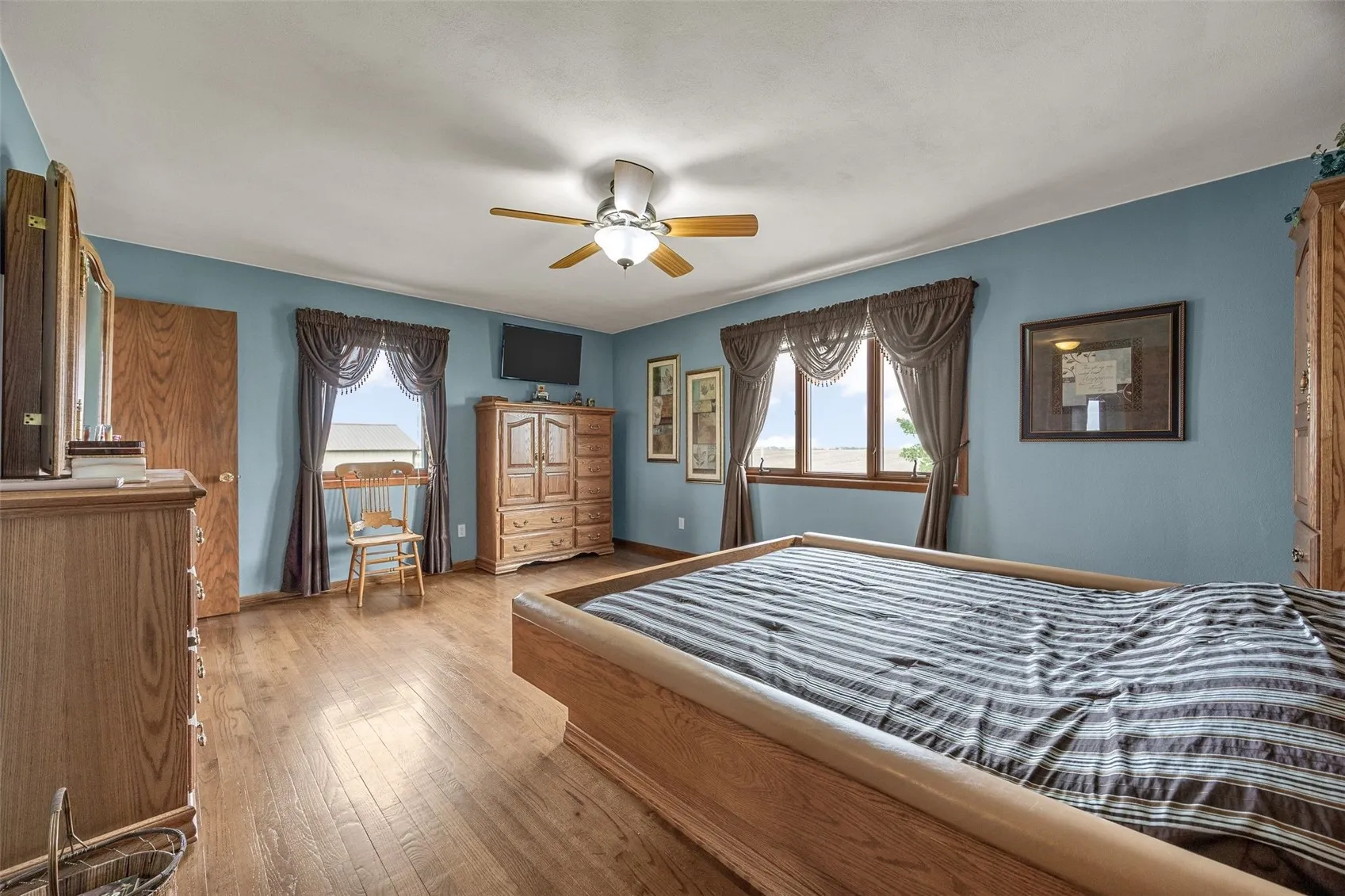 The primary is large and has wood floors.