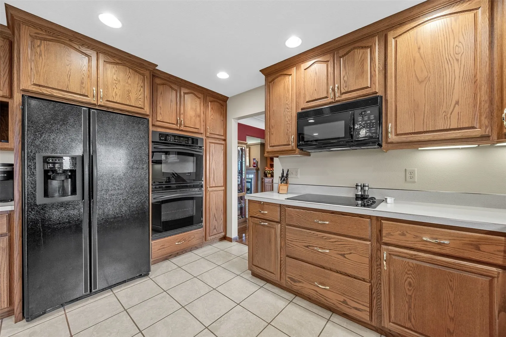 Double stove, side by side refridgerator/freezer, microwave and electric oven all stay with the property. Storage cabinets everywhere!