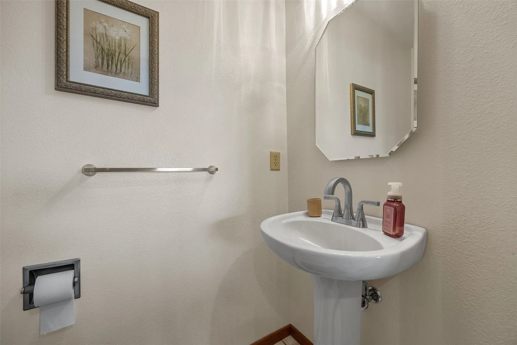 This is the half-bath just off of the kitchen area.