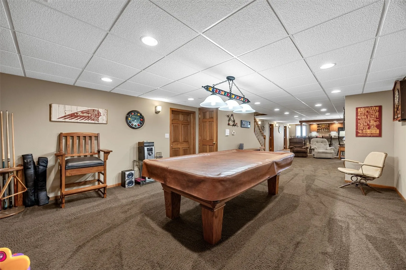 There is a plan for the pool table to stay but you get the idea of space.