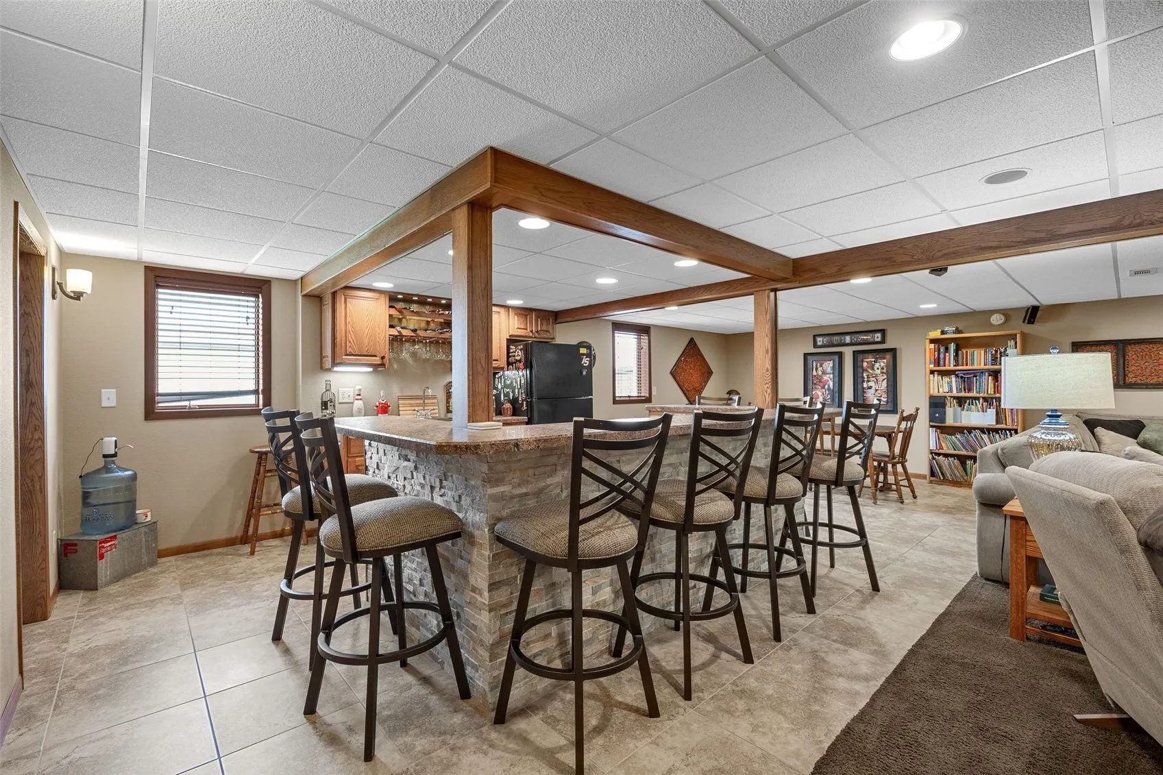 A kitchenette that doubls as a bar space.