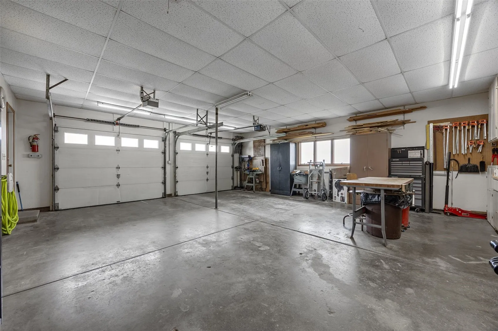 The two stall attached garage is oversized to allow for other uses as well.