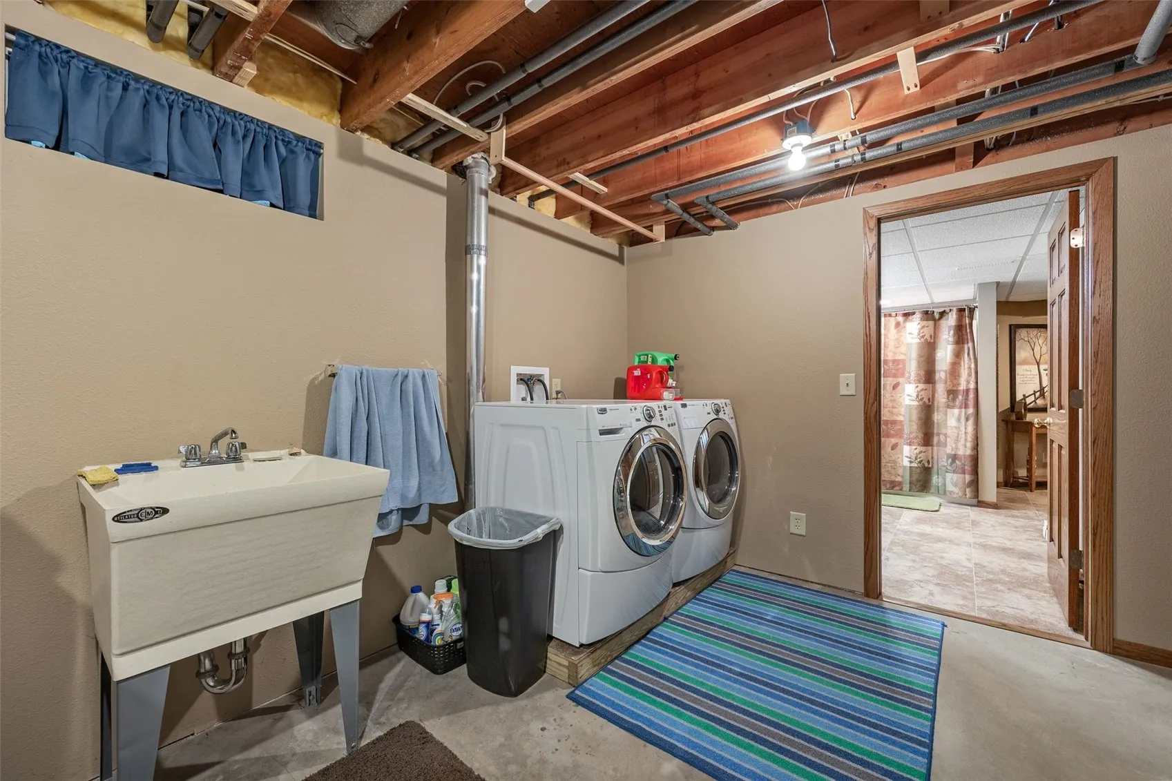 Laundry is located in the lower level. The washer and dryer stay with the property.