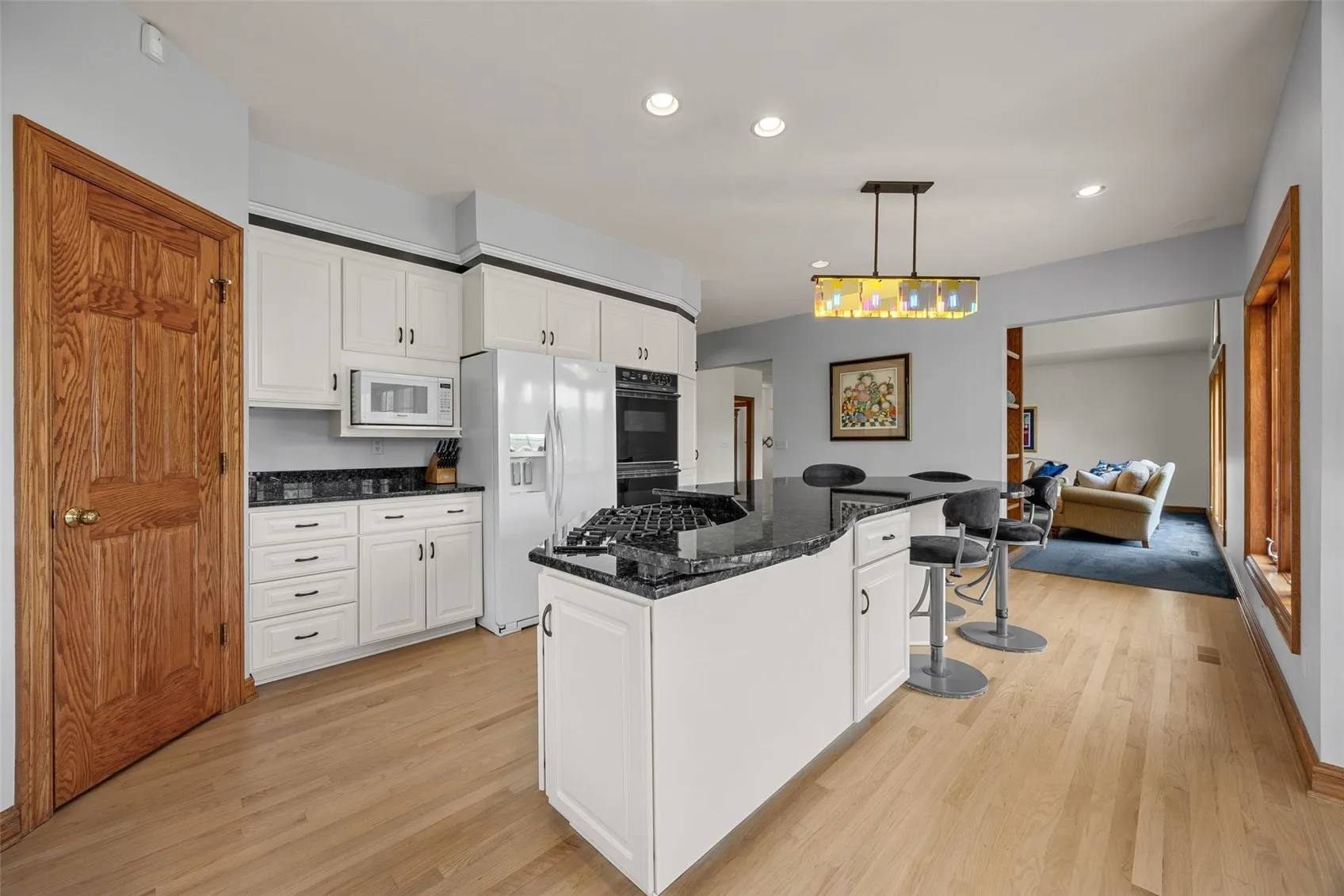 Floor-to-ceiling white cabinetry