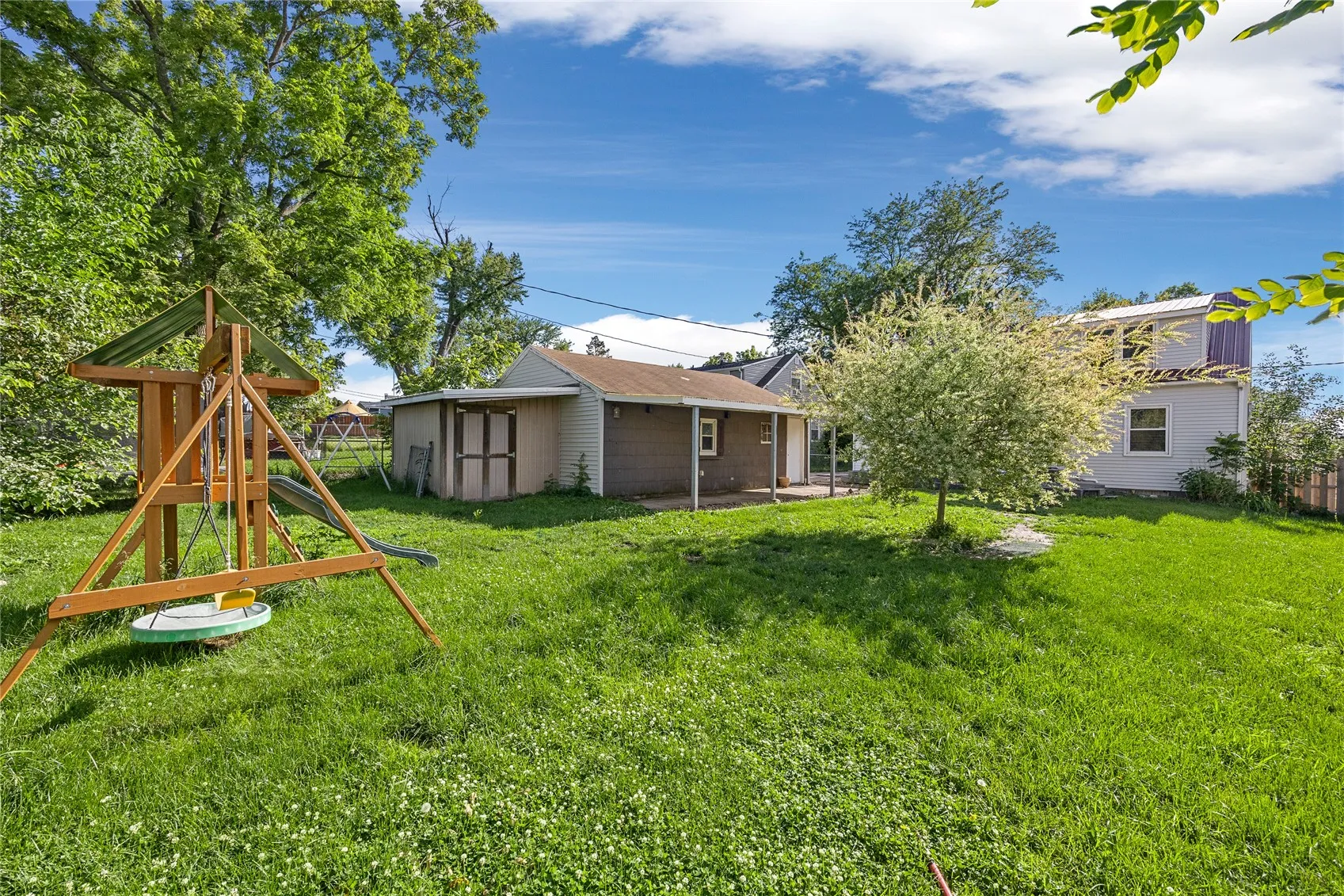 Flat, fenced in back yard