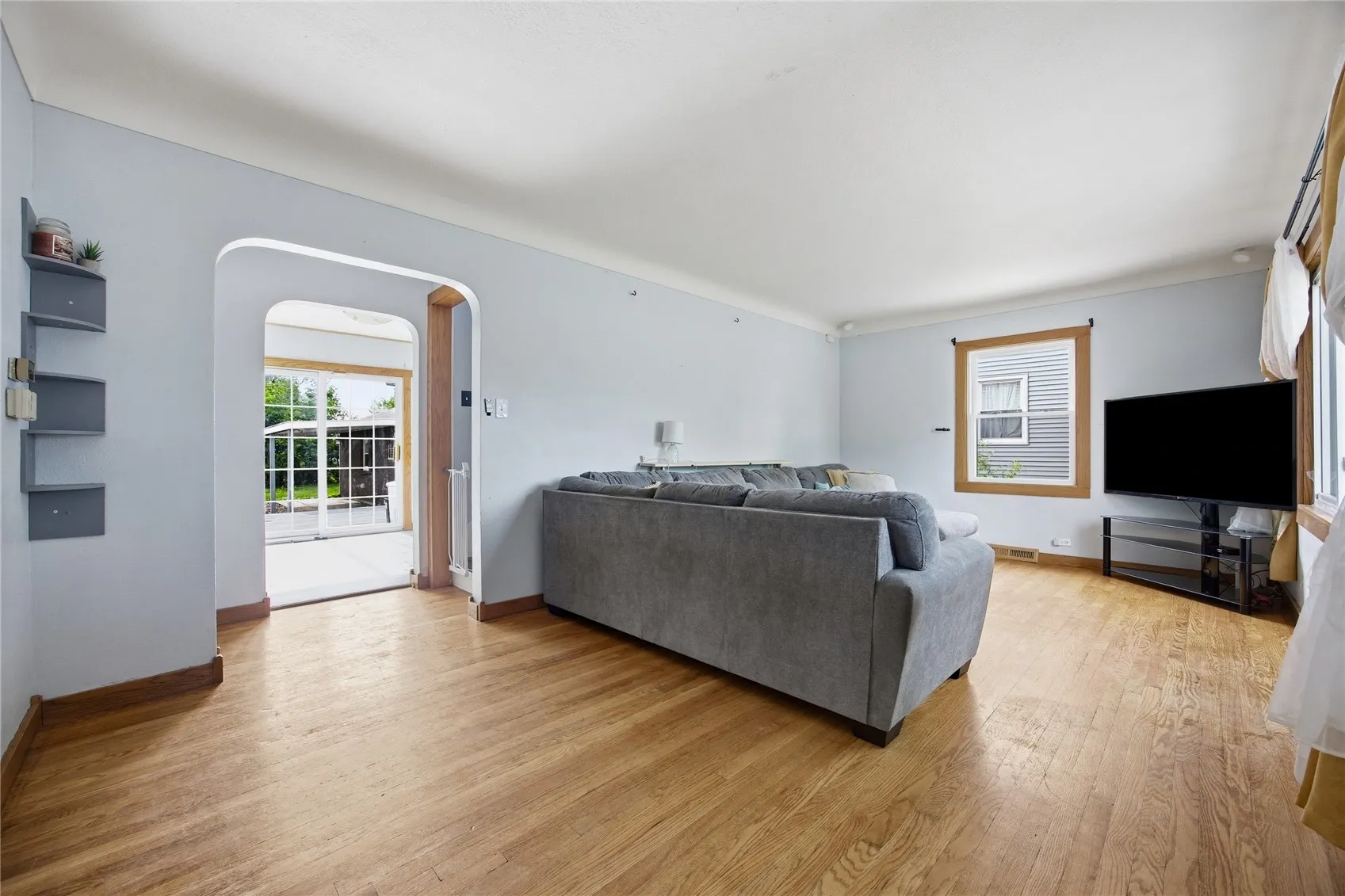 Bright living room with hardwood floors