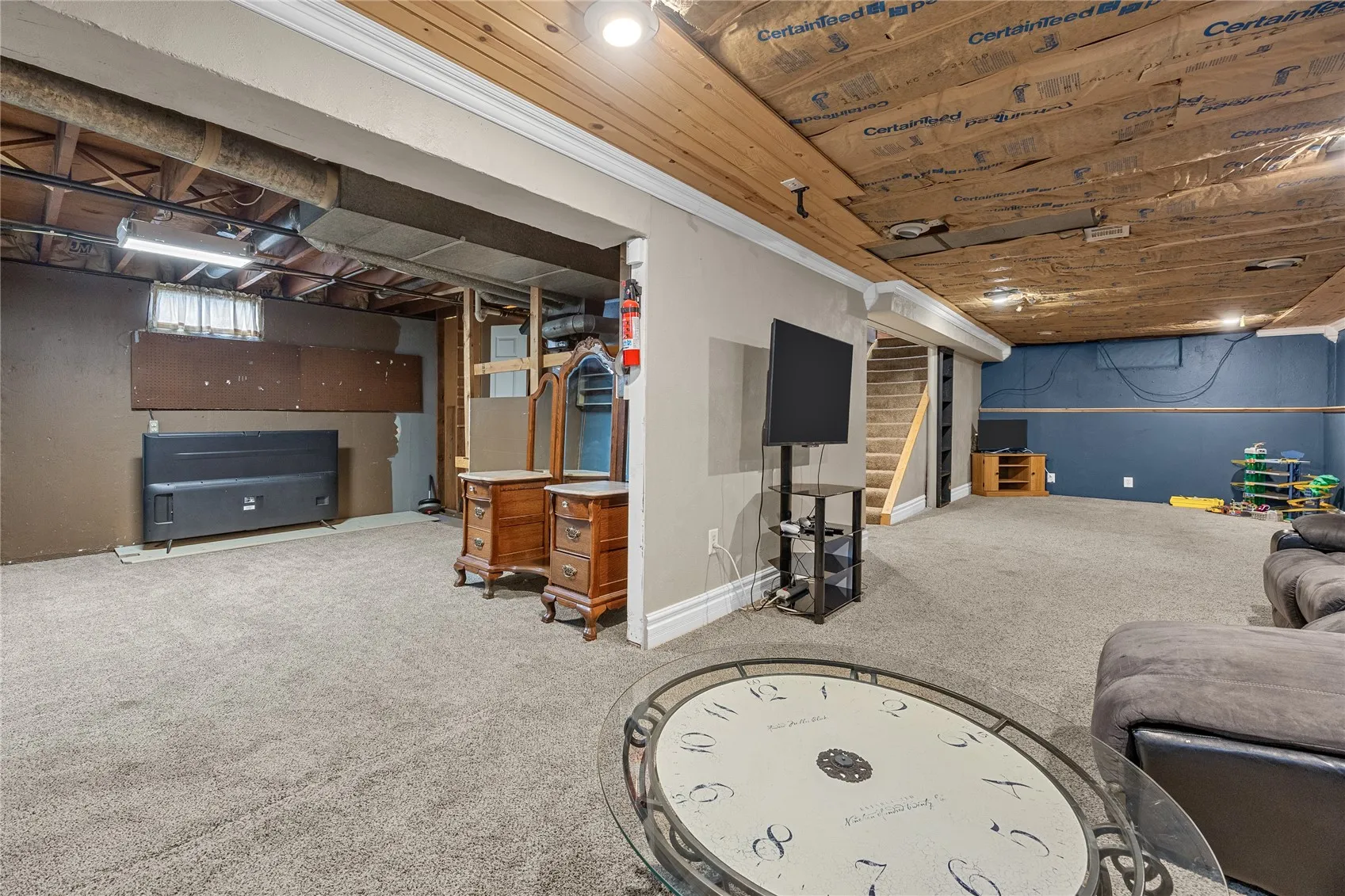Additional space in lower level for crafts, games, storage