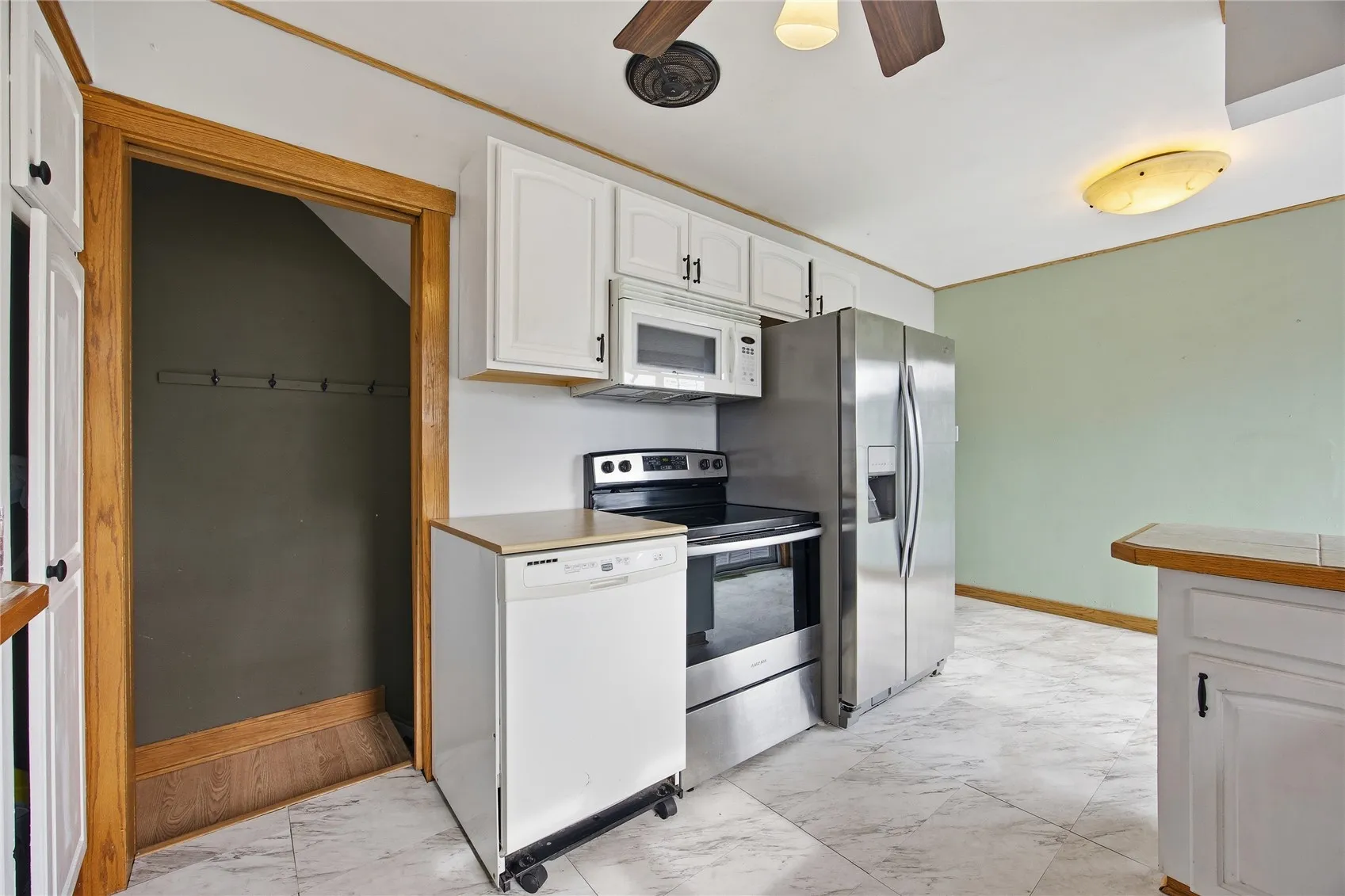 Entrance to lower level with pocket door