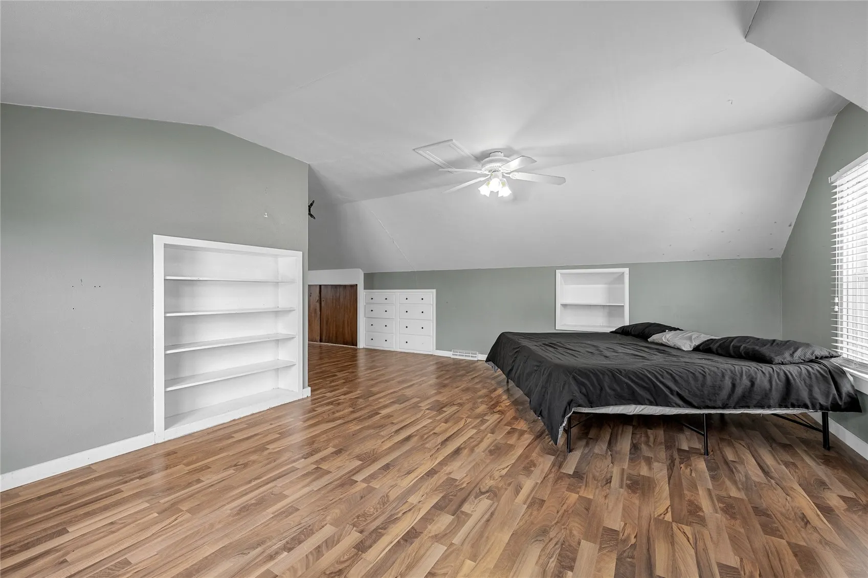 Finished 2nd floor bedroom with built-ins and a closet