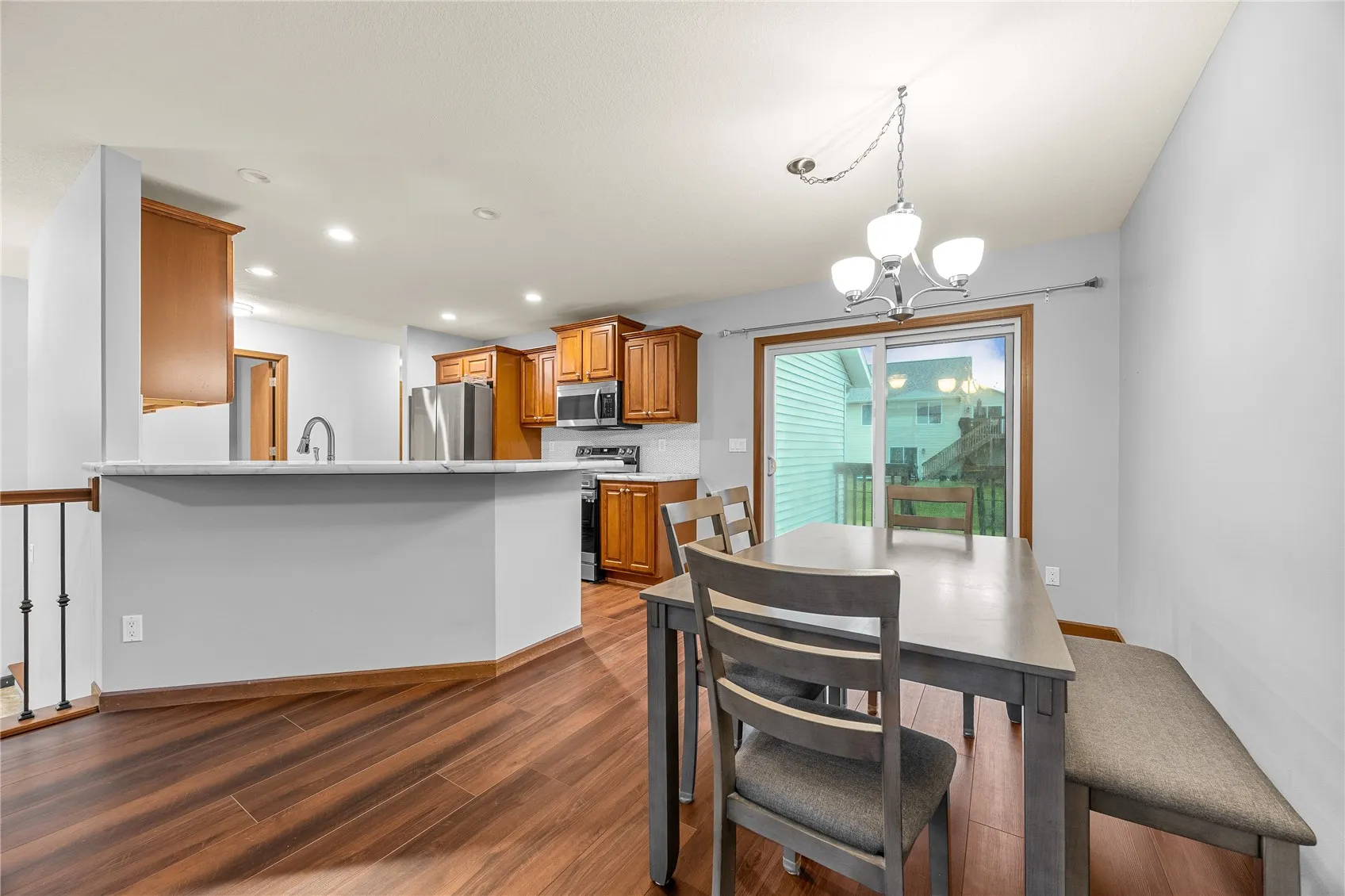 Kitchen opens to dining room