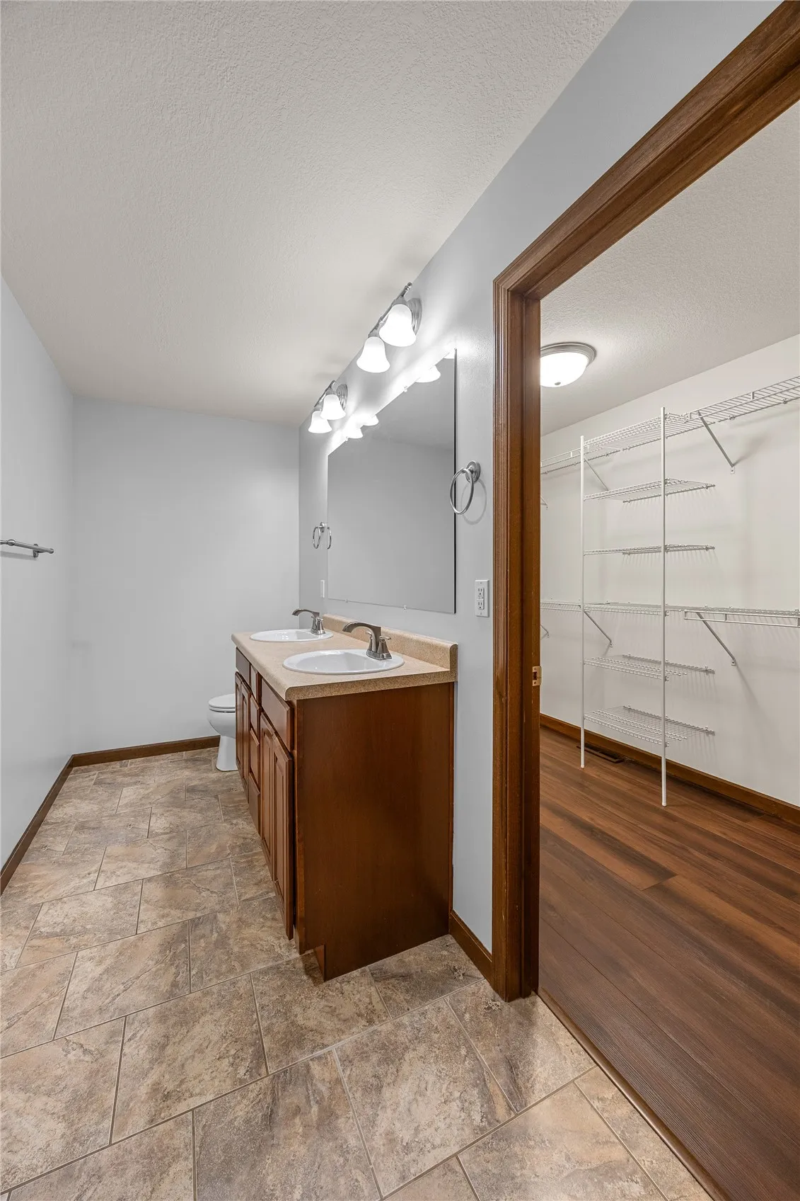 Well lit and roomy primary bathroom