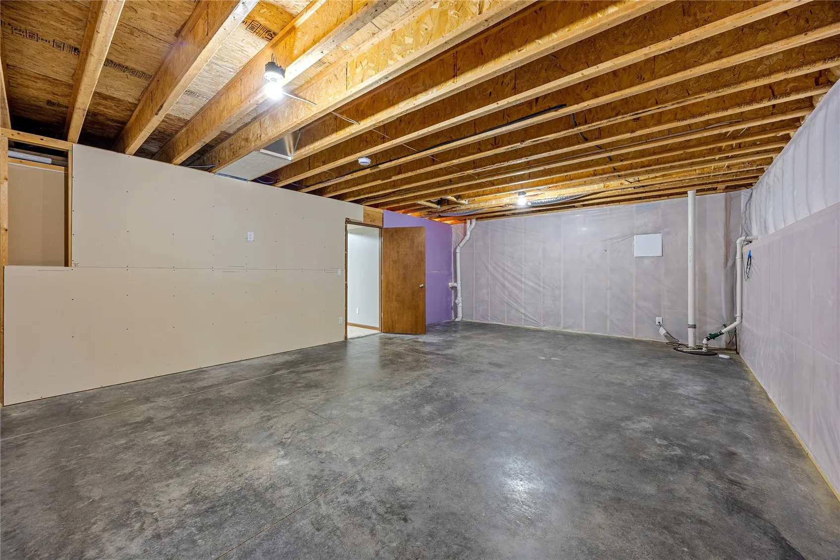 Sump pump area in additional space of lower level