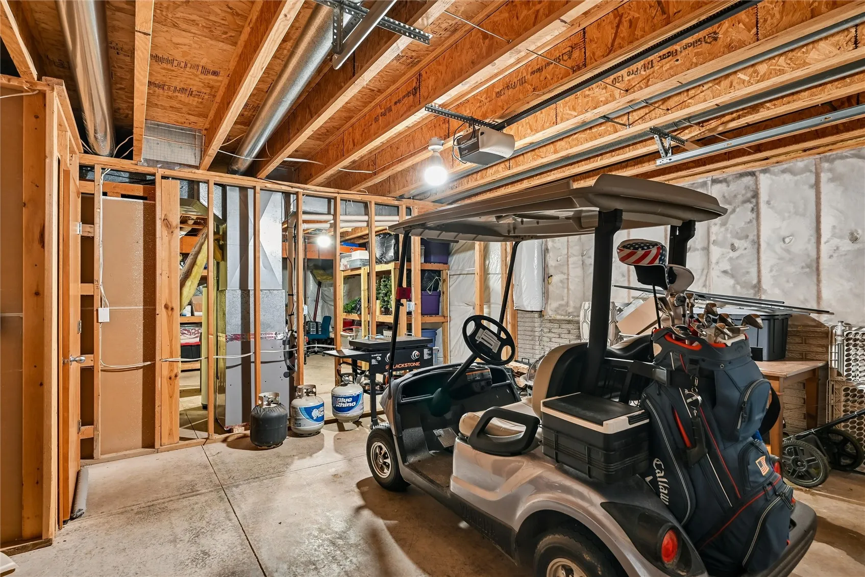 Golf Cart Garage with ample storage in front
