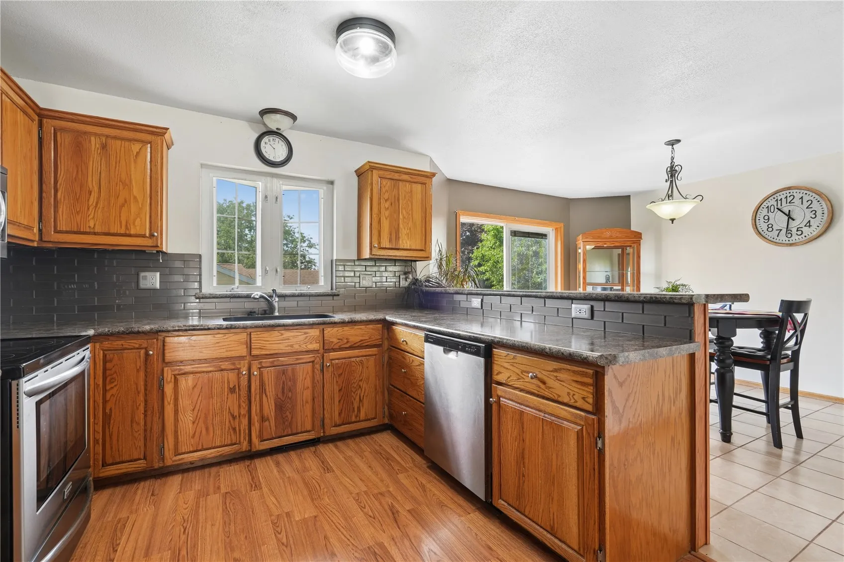 Kitchen with oak cabinets and flooring