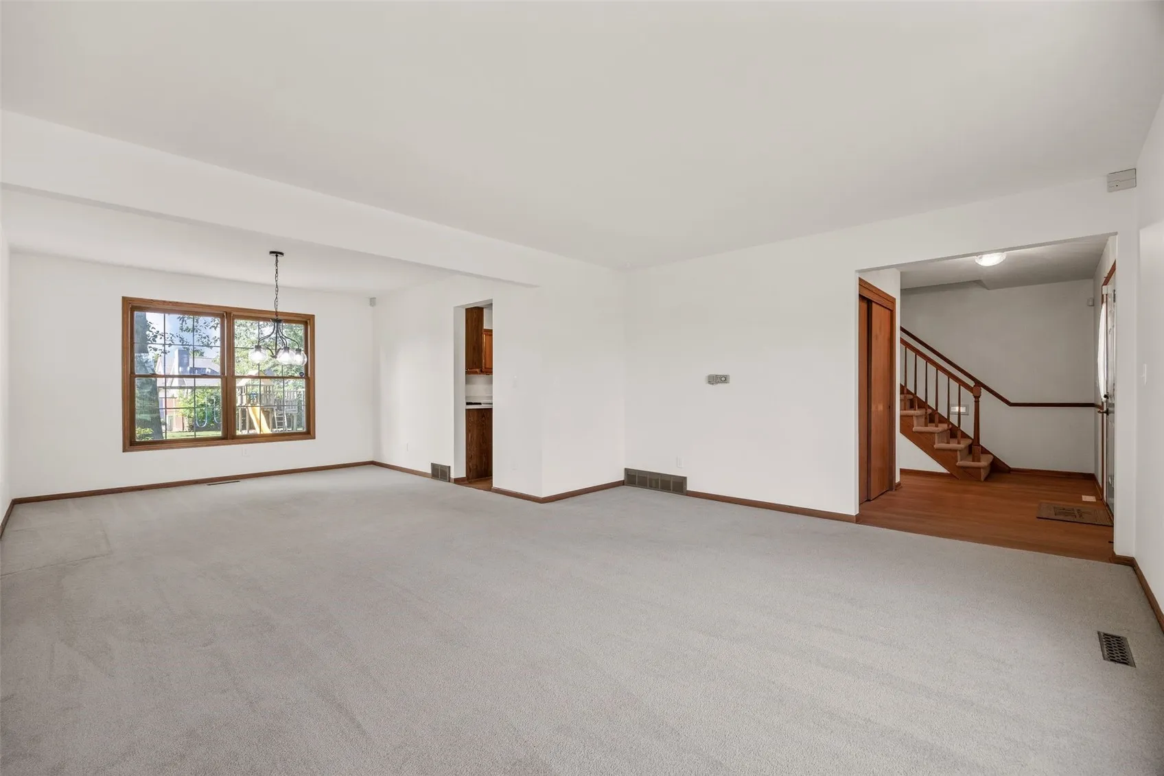 Living Room and Formal Dining ROom with Kitchen Access