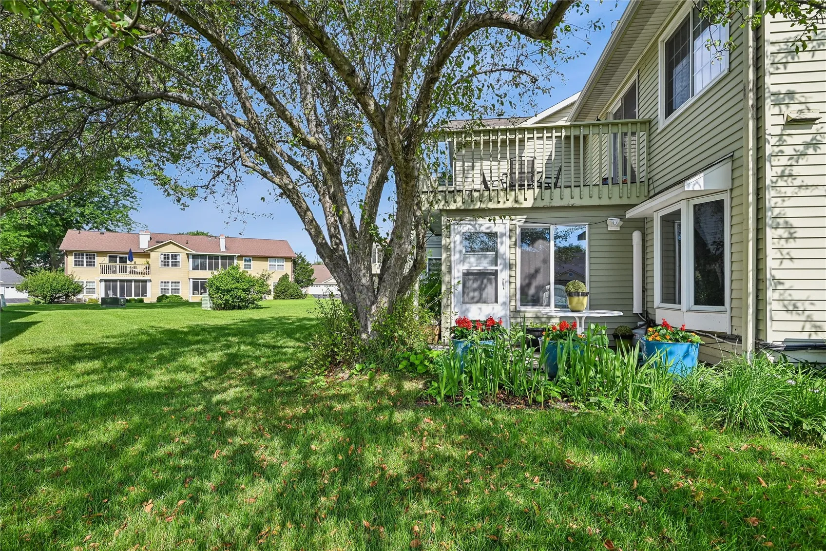 Cement patio in front of picture window
