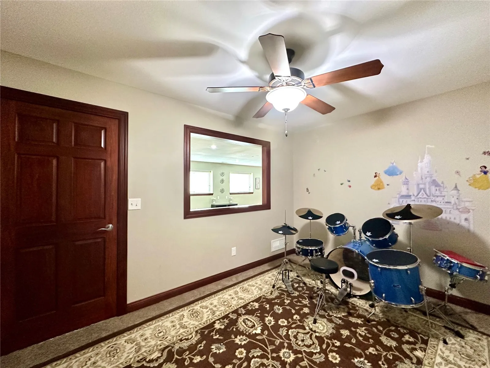 Lower level Office,Den,Exercise or Toy Room. Could be a non-conforming bedroom as well.