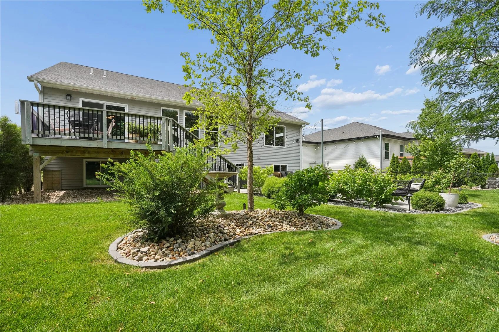 private back yard w/ extensive landscape