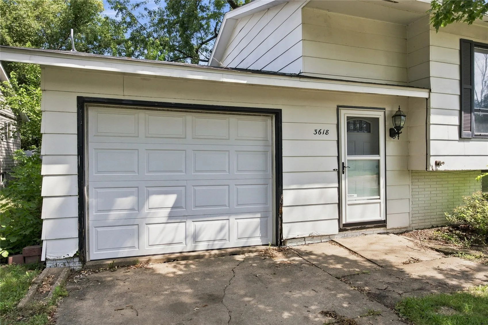 One-car attached garage.  No direct entry to house from garage.