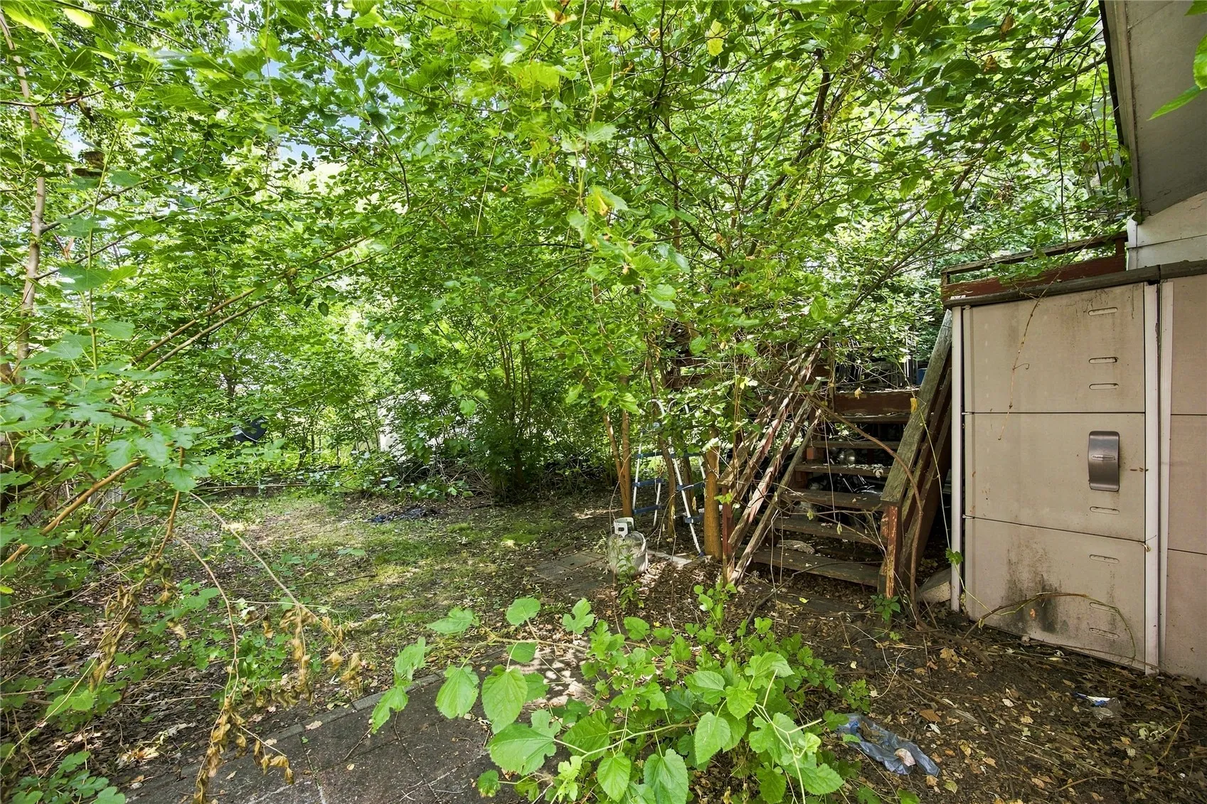 Back deck, stairs to backyard.