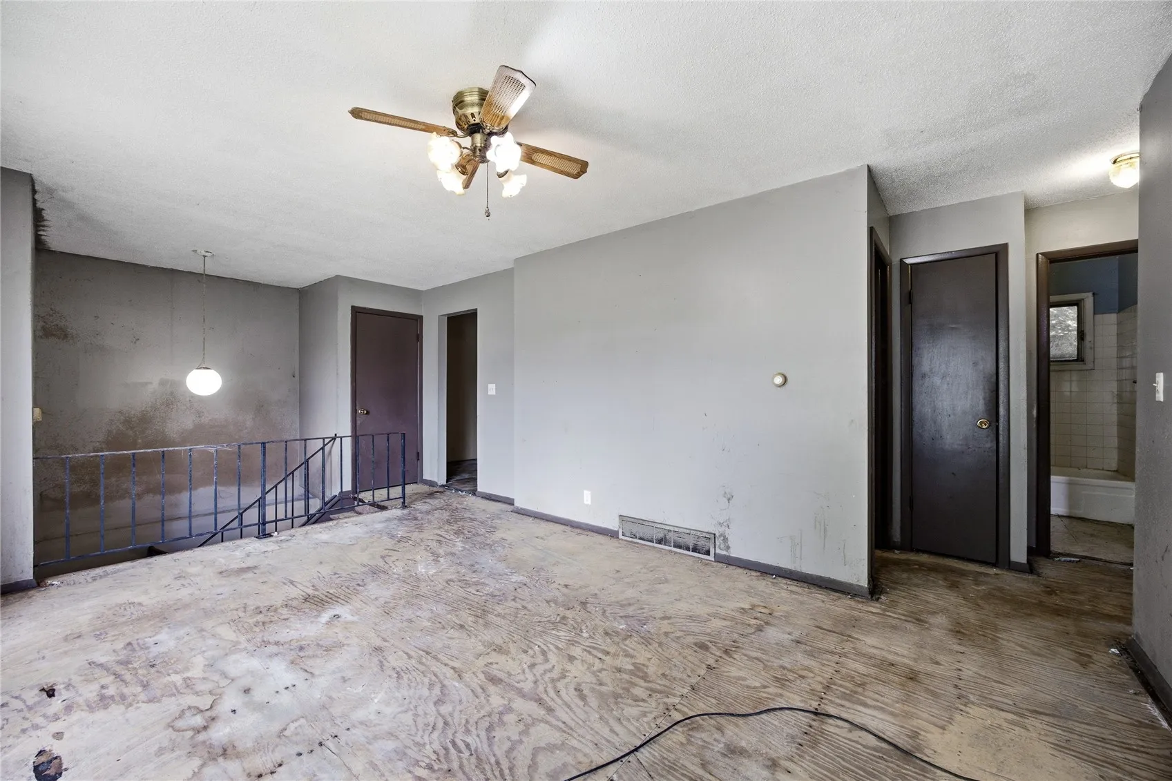 Wall space for art, family photos, entertainment center.