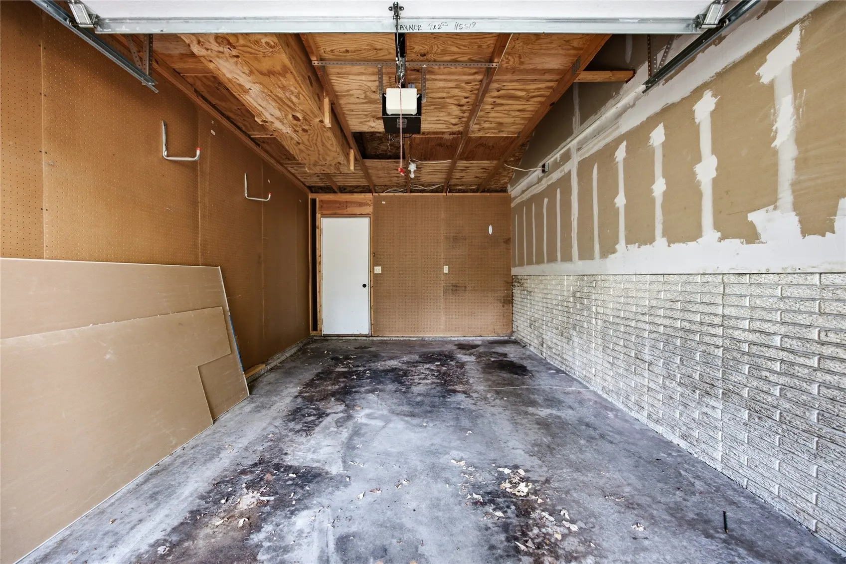 One-car attached garage. Service door to backyard.