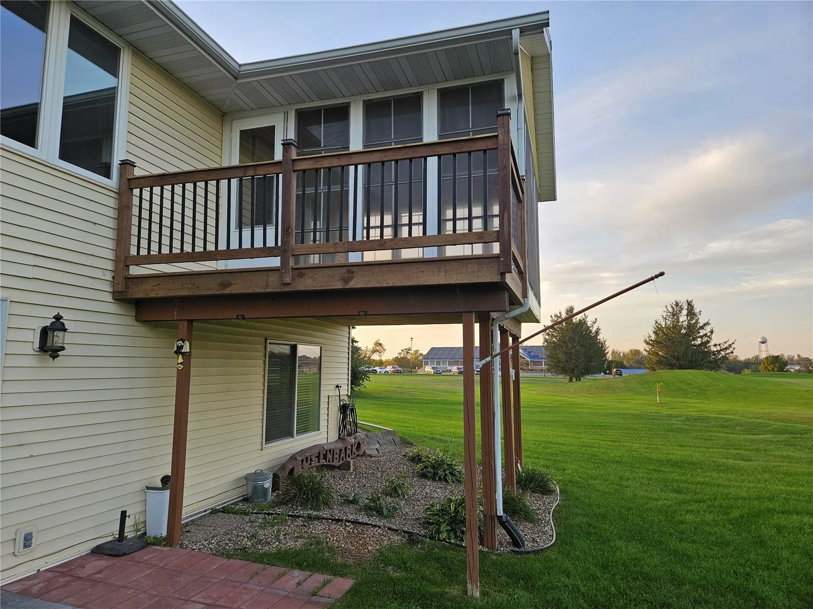 Updated and rebuilt deck with black iron spindles
