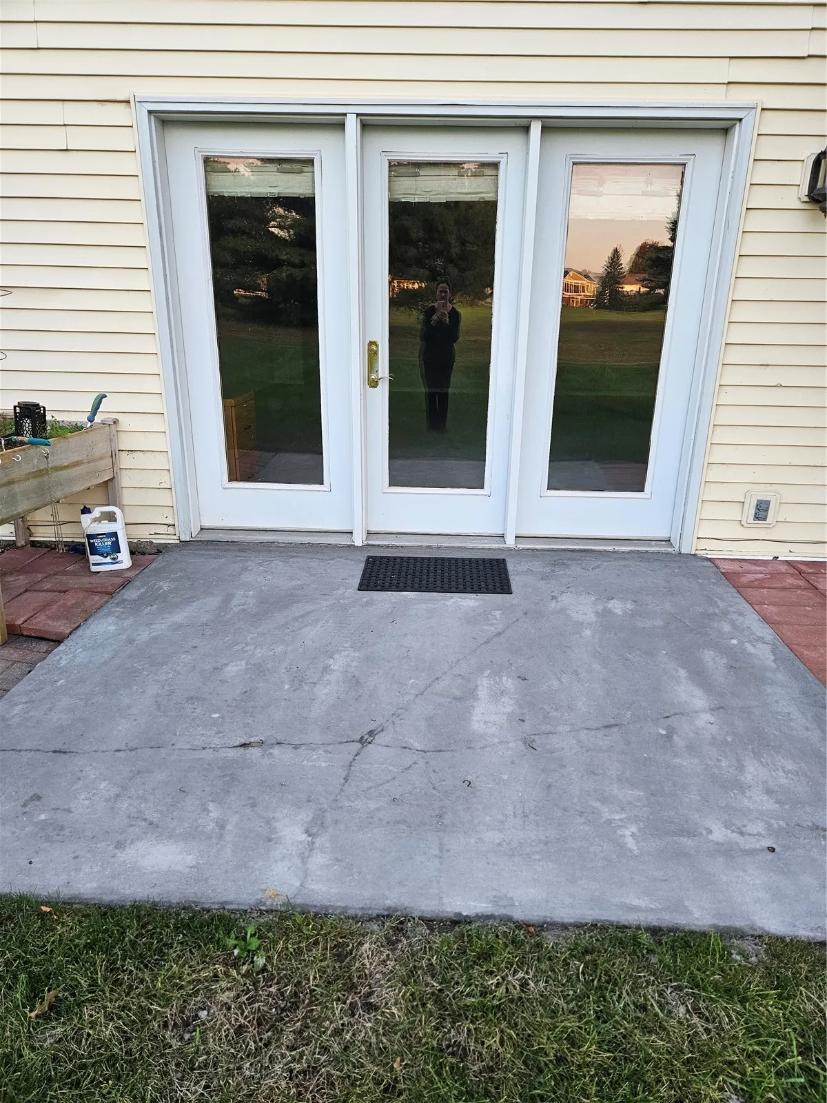 Concrete patio at lower level walkout improved