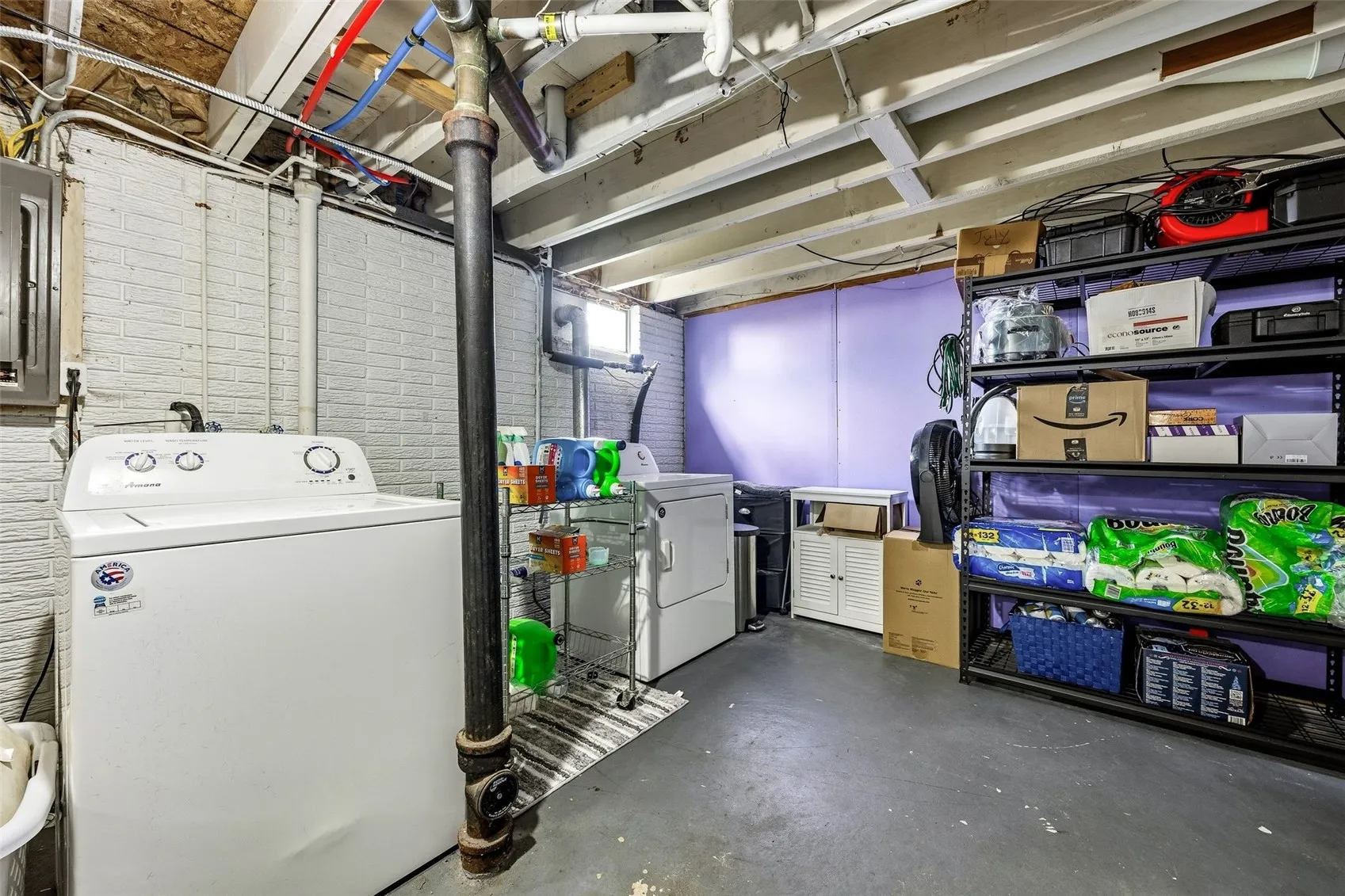 unfinished basement area/ Laundry area